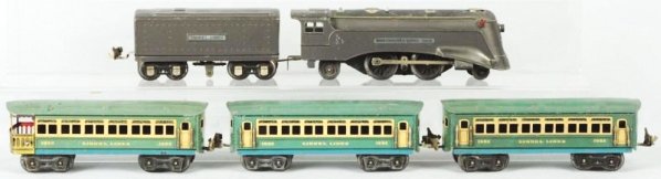 Lionel O27-Gauge Passenger Train Set.: Pre-war. Tinplate. Includes no. 1689E bullet nose type engine with matching Lionel Lines tender and three Lionel Lines passenger cars in blue. Some scratching and wear throughout. Condition (Very Good