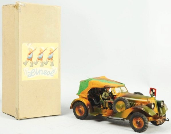 Lineol 1201/5 Kübelwagen in Original Box.: Clockwork tinplate military vehicle. Electric lights and motor are not tested. Rust in battery box. Seated figures are original. Condition (Very Good - Excellent). Size 9 - 1/2" L.