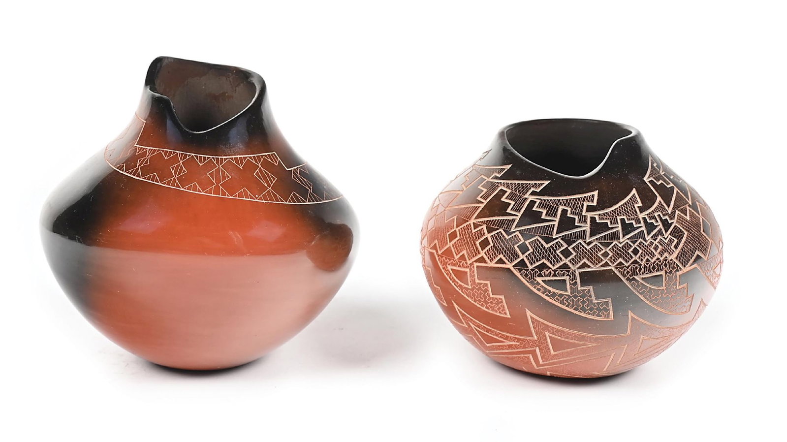 LOT OF 2: SANTA CLARA POTTERY JARS BY POLLY ROSE FOLWELL: Both incised on bottom "Polly Rose". Overall geometric pattern covering the sides of each. Provenance Estate of a Lake Tahoe collector, Dr. Margaret McKee Dimensions: Largest: 4 - 3/4" Dia. x 4 - 1/2"