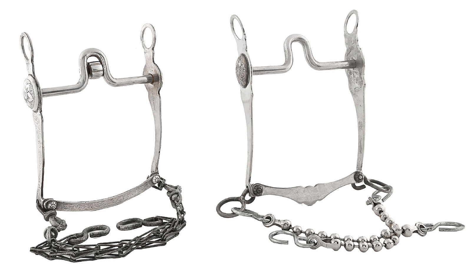 LOT OF 2: BOHLIN SILVER OVERLAID BITS: Lot consists of: (A) Bohlin stainless silver overlaid bit with engraved cheeks and slobber bar with original rein chains. Marked inside cheek: BOHLINMADE / CALIF. / HOLLYWOOD. (B) Bohlin stainless ste
