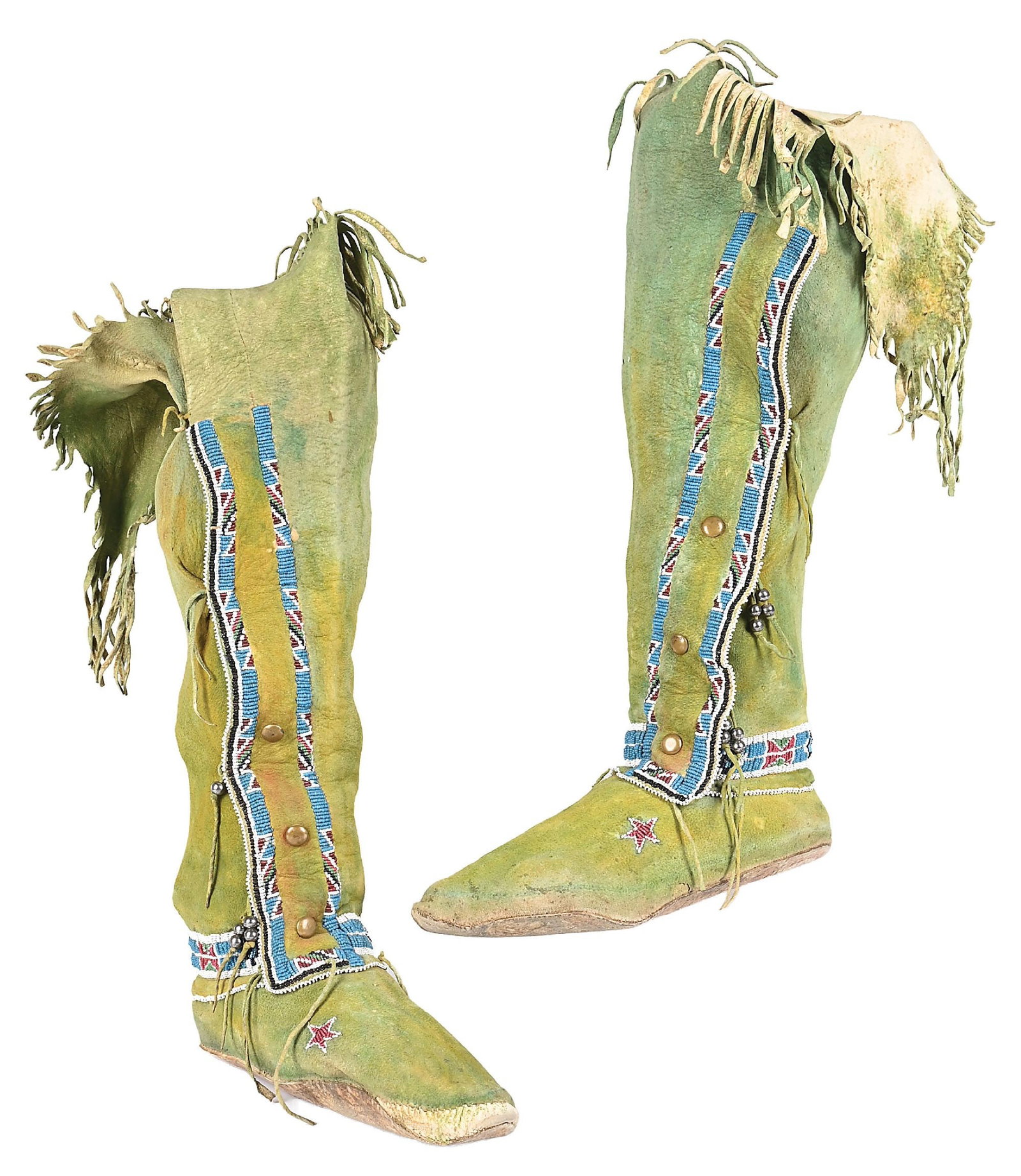 KIOWA (CÁUIGÚ) HIGH-TOP WOMEN'S MOCCASINS: Covered with green pigment. Beaded strips on each side of brass buttons and around the ankle. Each moccasin top has a beaded star. Soles show wear. Fringe top. Colors: blue, translucent red,
