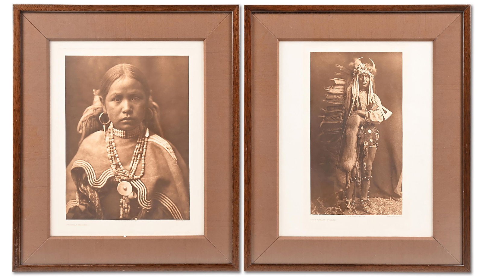 LOT OF 2: E.S. CURTIS PHOTOGRAVEURES: Circa unknown. (A) Jicarilla Maiden (B) Iron Breast-Piegan Dimensions: Largest: 25 1/2" x 21 1/2".