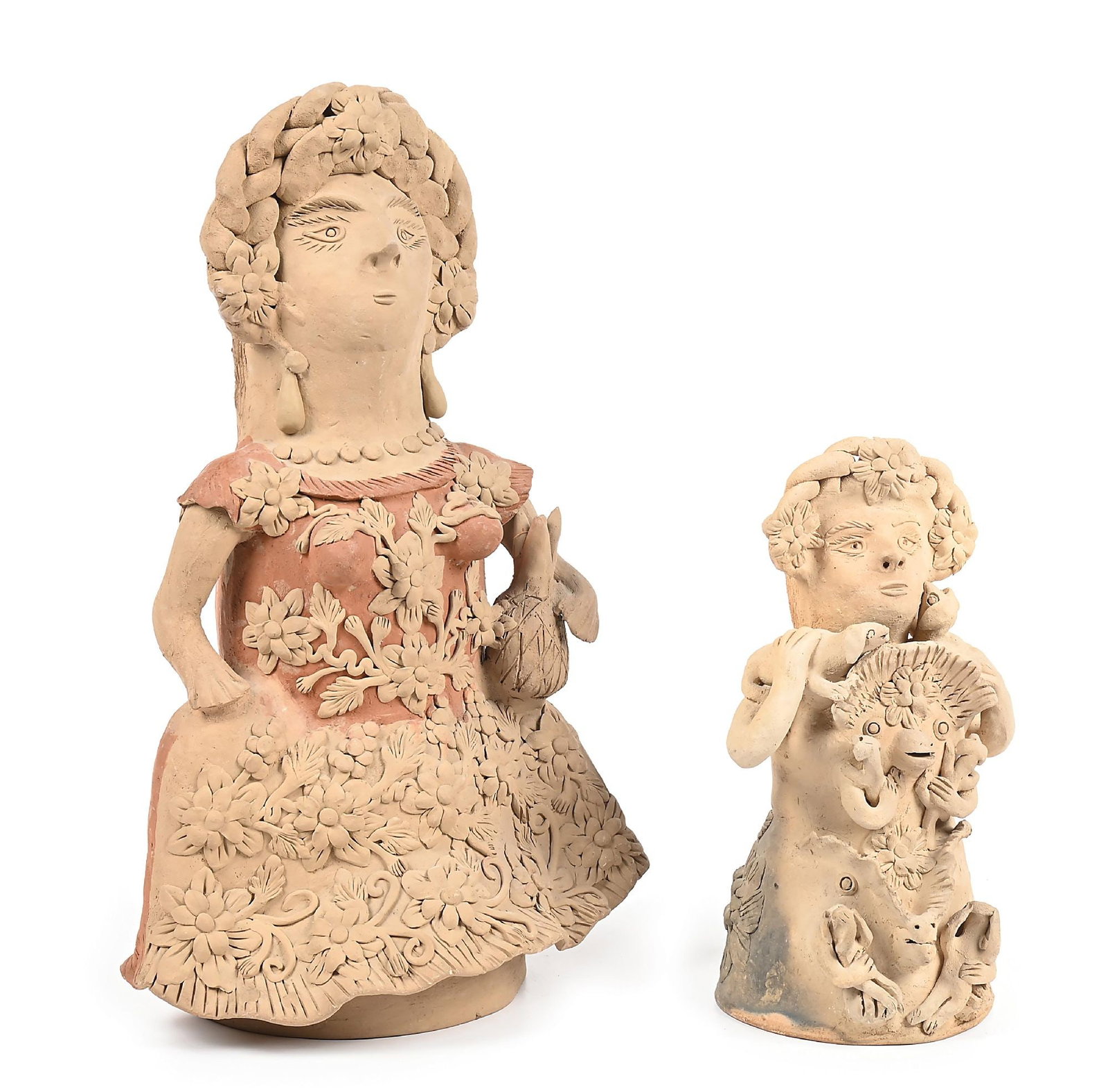 LOT OF 2: MEXICAN POTTERY FIGURES BY TEODORA BLANCO NÚÑEZ (1928-1980): Each of a female figure holding animals and well-adorned dresses, each done in the style of Blanco Núñez of natural beige and reddish-color clay. Largest - 13" L x 9" W x 20-1/2" H