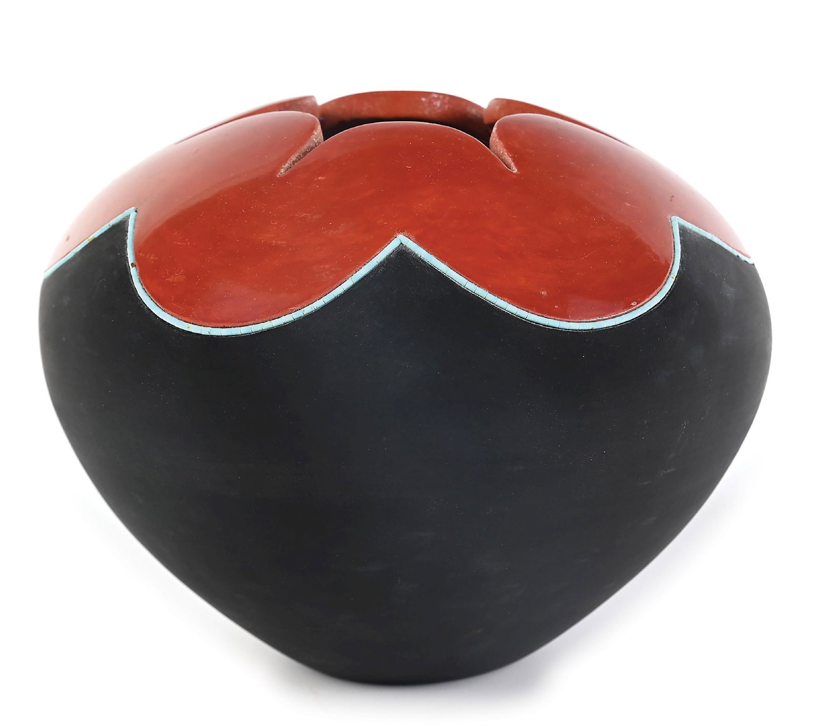 SAN ILDEFONZO SEED JAR BY RUSSELL SANCHEZ: San Ildefonso Seed Jar by Russell Sanchez, incised on base "Russel Sanchez 1999". A large format stylized seed jar with a singular floral design, enhanced by an outline of inlaid turquoise. Slight wea