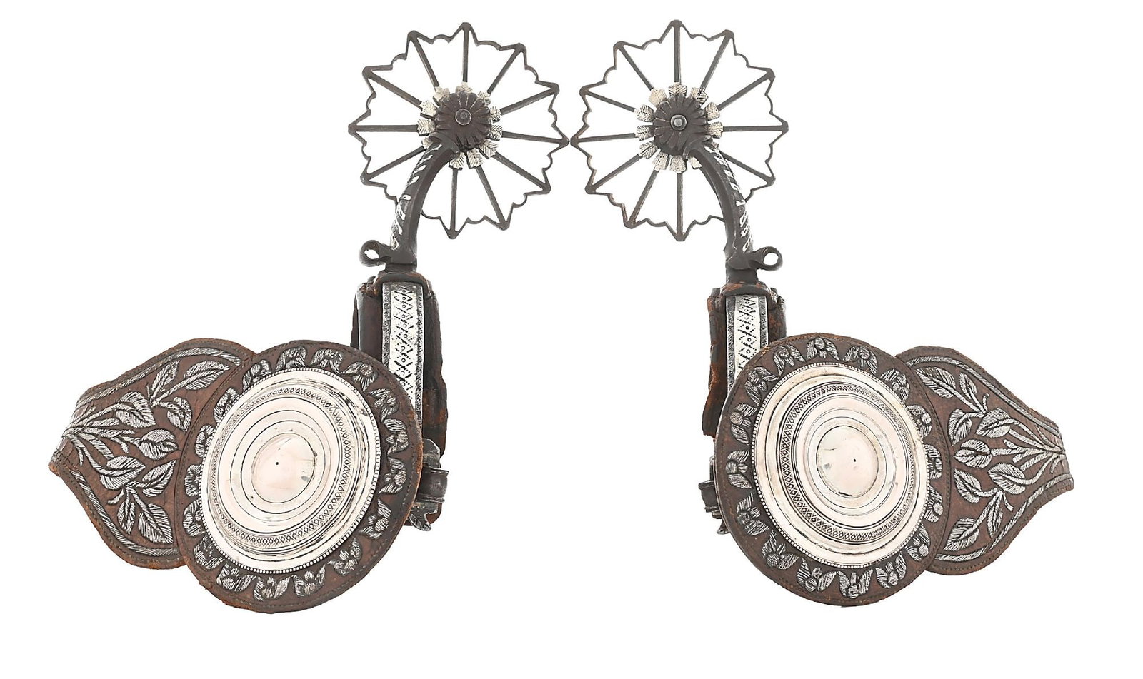 FINELY EXECUTED MEXICAN COLONIAL SILVER MOUNTED SPURS: Rare seen in this condition and still together as a set, these spurs still retain the original leather lining. Finished in the finest traditions of Spanish influenced master Mexican craftsmen of the c