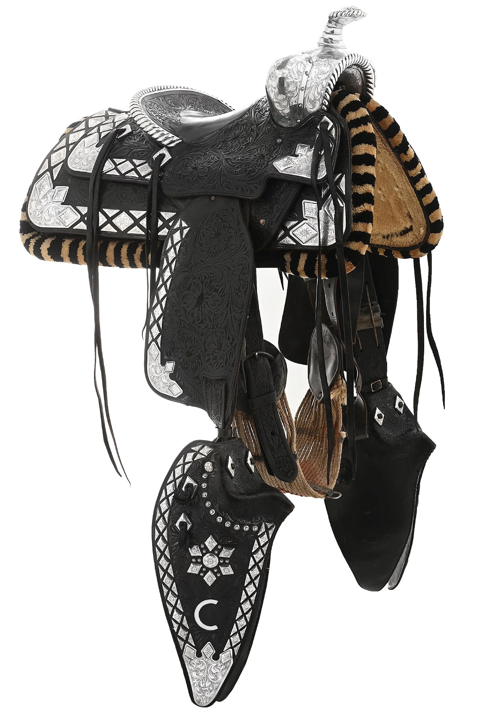 RAY "CRASH" CORRIGAN'S PERSONAL SCREEN-USED EDWARD H. BOHLIN PARADE SADDLE: This film used black floral carved "Dick Dickson Jr" model Edward H. Bohlin saddle is built on a Miles City tree with 13" swells, 14" seat, and 3-1/2" cantle. The Bohlin seat plate is engraved with th