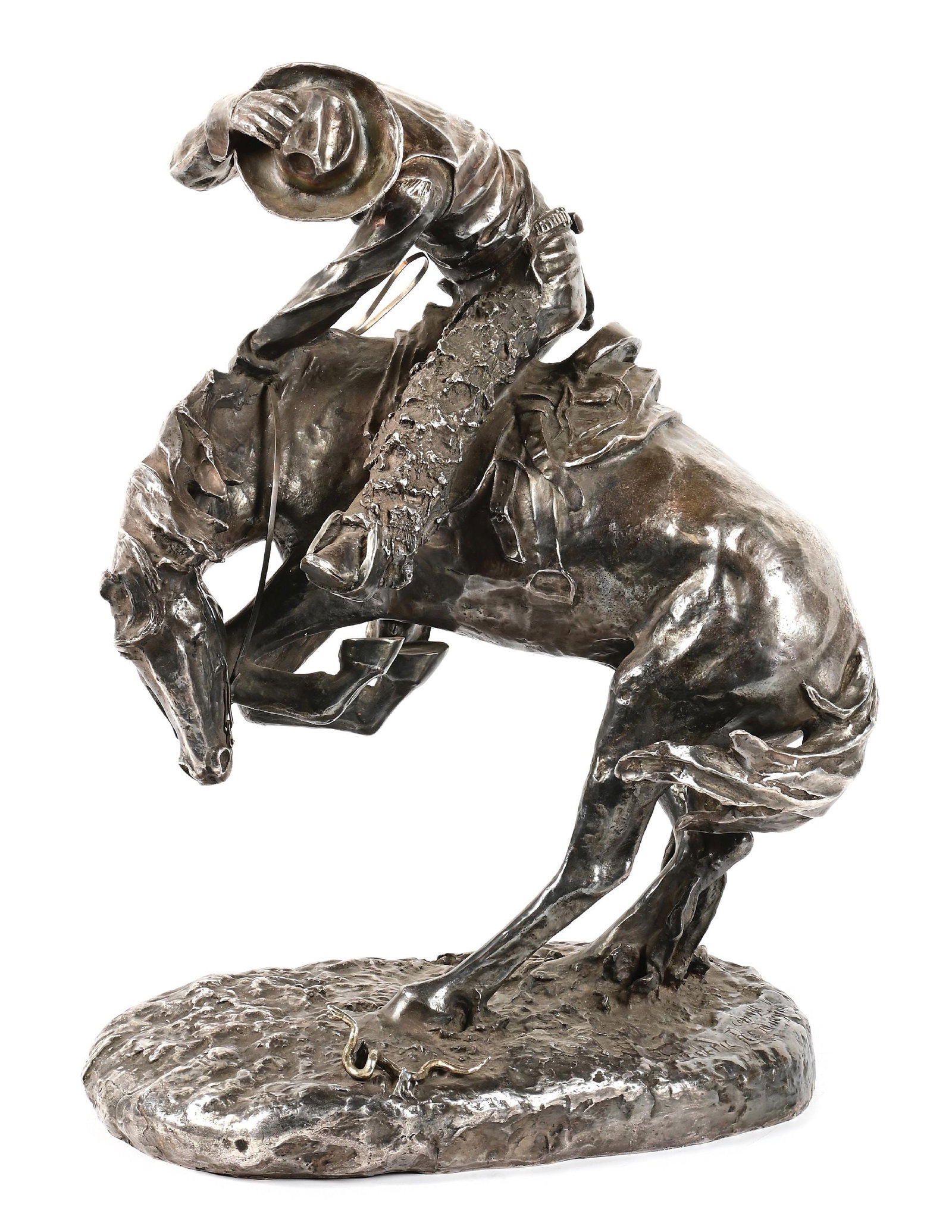 FREDERIC REMINGTON'S "THE RATTLESNAKE" CAST IN 1000 OZ OF SILVER: Stunningly detailed fine sculpture cast in 1000+ Troy oz. of .999 silver after Frederic Remington's "Bronco Buster" that was originally created in 1895. Cast at the Maiden Foundry in 1989 using a