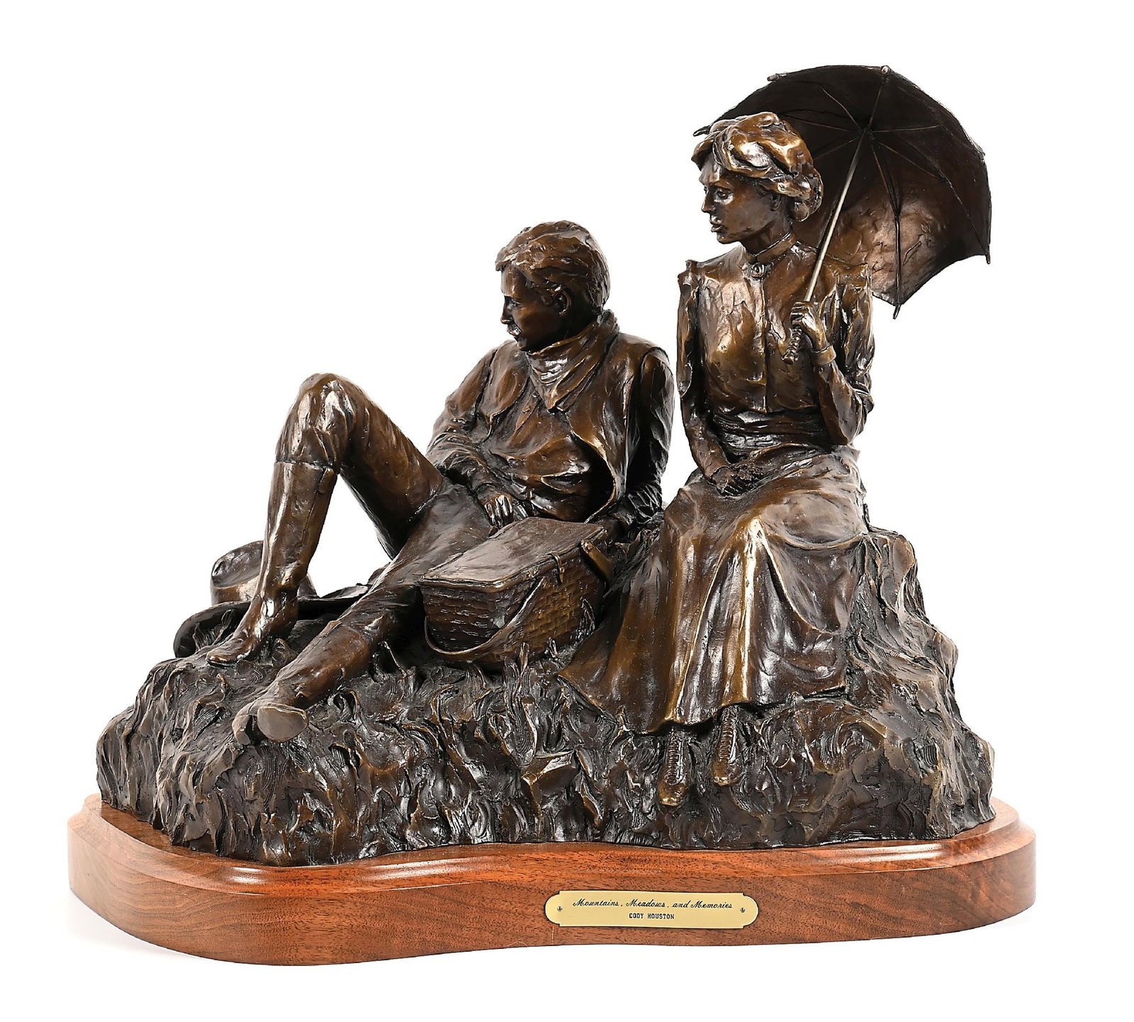 CODY HOUSTON (B. 1941): Mountains, Meadows, and Memories bronze 21" x 14" x 17" H with stand: 19" H signed on back "Cody Houston, 8/20" A couple on a picnic: lady with umbrella, man leaning back in a relaxed pose, with his