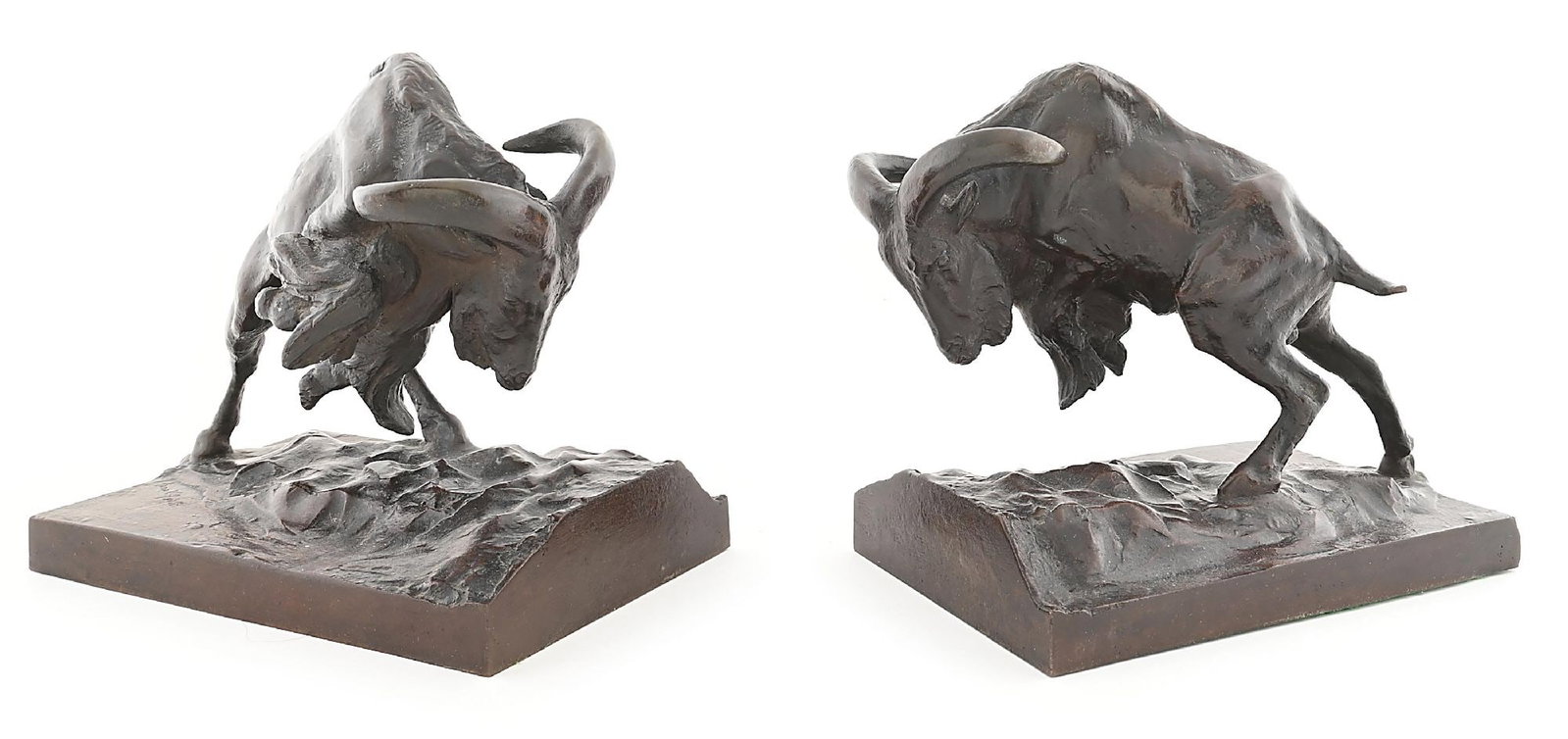ANNA VON HYATT HUNTINGTON (1876-1973): A matched pair of bookends each: 8" L x 5-1/4" W x 7-1/4" H signed at the base "Anna V. Hyatt" Each showing a ram charging forward. Dimensions: Each Approx: 8" x 5 - 1/4" x 7 - 1/4".