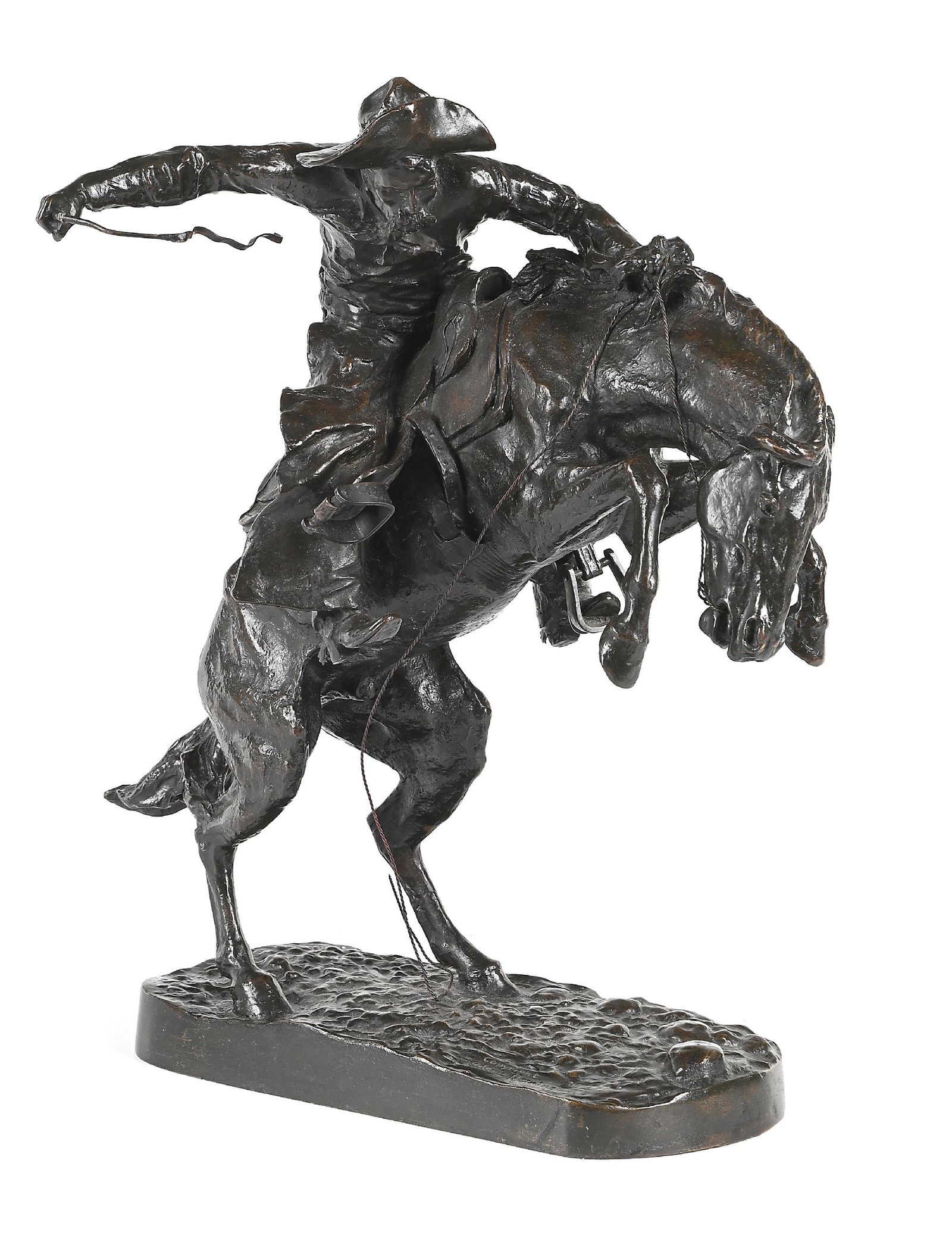 FREDERIC REMINGTON, AFTER (AMERICAN, 1861–1909): The Bronco Buster lost-wax cast bronze with dark patina 20-1/2" L x 13" W x 22" H marked on the base "Copyright by Frederic Remington", stamped on the base "No. 263" cast by Roman Bronze Works, NY,