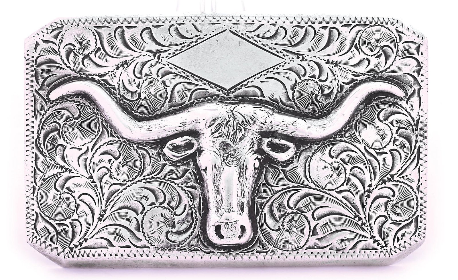 EDWARD H. BOHLING STERLING LONGHORN BUCKLE: Circa 1950s engraved figural sterling silver belt buckle. Reverse is marked: Edward H. / Bohlin / Hollywood, Cal./ STERLING. Overall engraved with detailed foliate motifs and a longhorn in relief for 