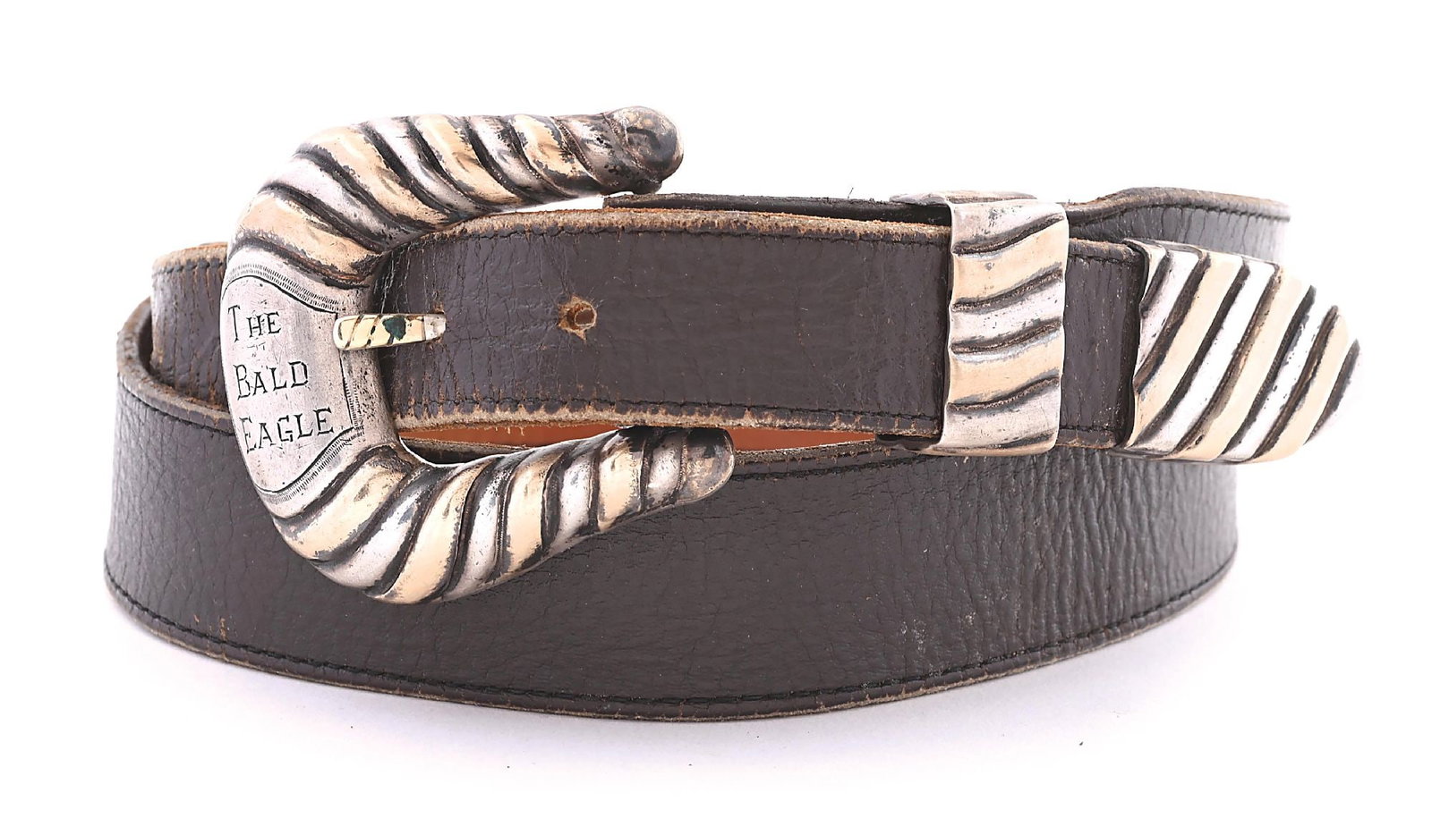 EDWARD BOHLIN BELT WITH STERLING SILVER AND GOLD BUCKLE.: Finely made Bohlin of Hollywood marked belt and silver and gold washed “Cheyenne” buckle set. Belt and buckle both are found in older and current catalogs. Originally designed for the sile