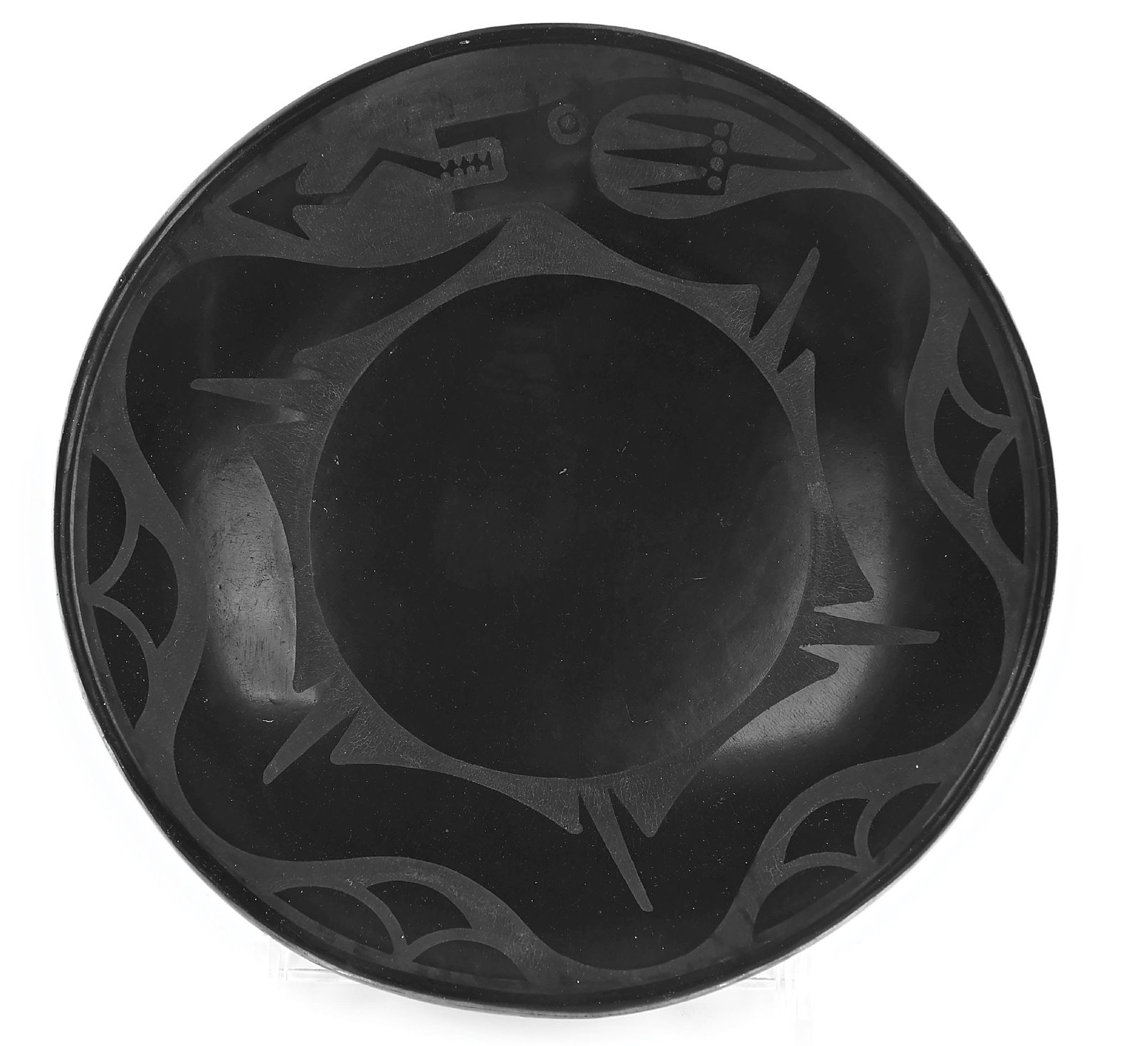 MARIA MARTINEZ (1887-1980) & POPOVI DA (1923-1971) SAN ILDEFONSO (P’OHWHOGEH) BLACKWARE PLATE: Mid-20th century. With an Avanyu pattern. Signed on base "Maria / Popovi 766". 7" Dia. Condition: Excellent. Dimensions: 7" Dia.