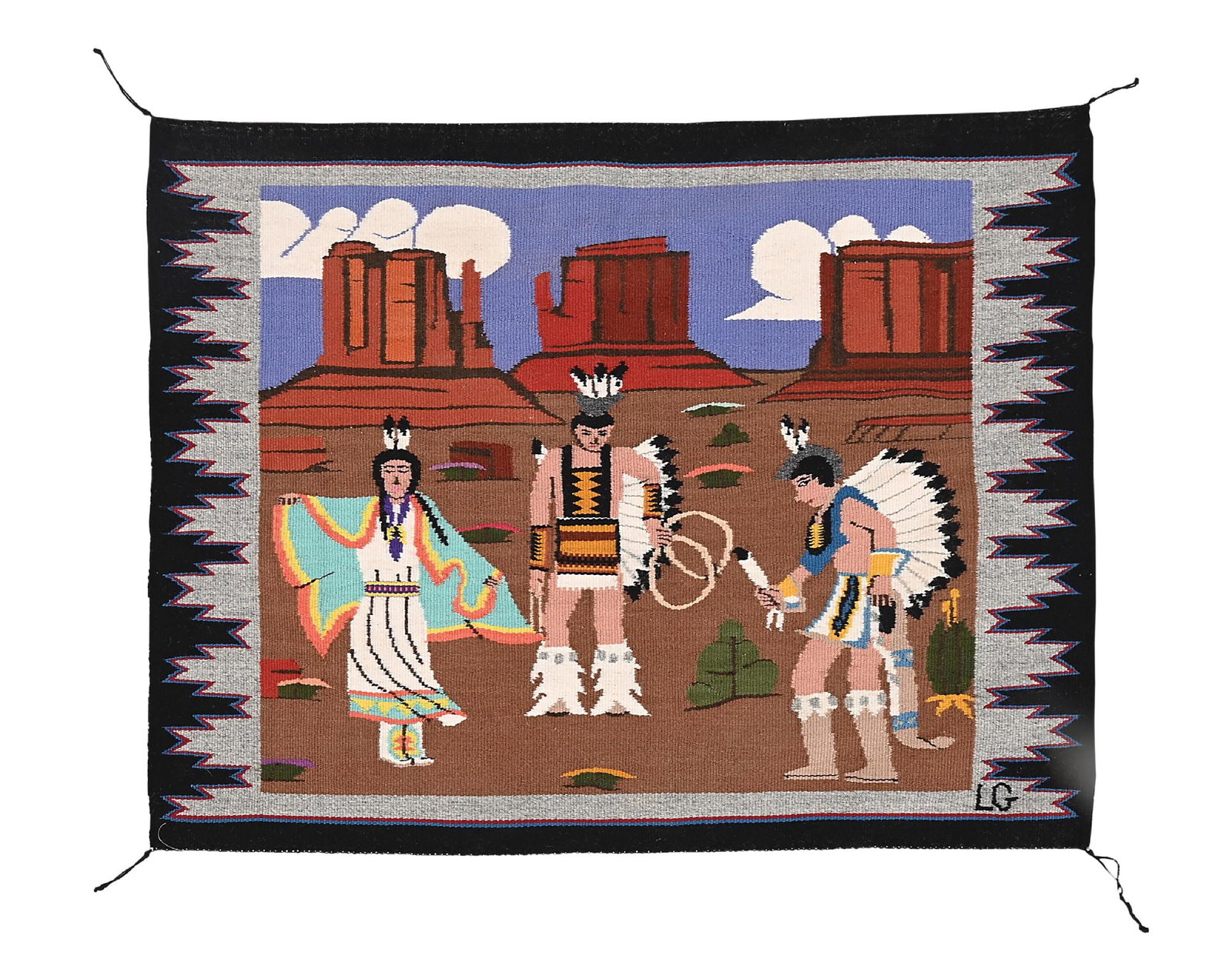 NAVAJO (DINÉ) PICTORIAL WEAVING BY LAVERNE GREYEYES: Depicting the Hoop Dance in Monument Valley. With attached photo and tag, reading Laverne Greyeyes. Dimensions: 30-3/4" by 24" Colors: shades of brown, blue, white, grey, black, burgundy, green, turqu