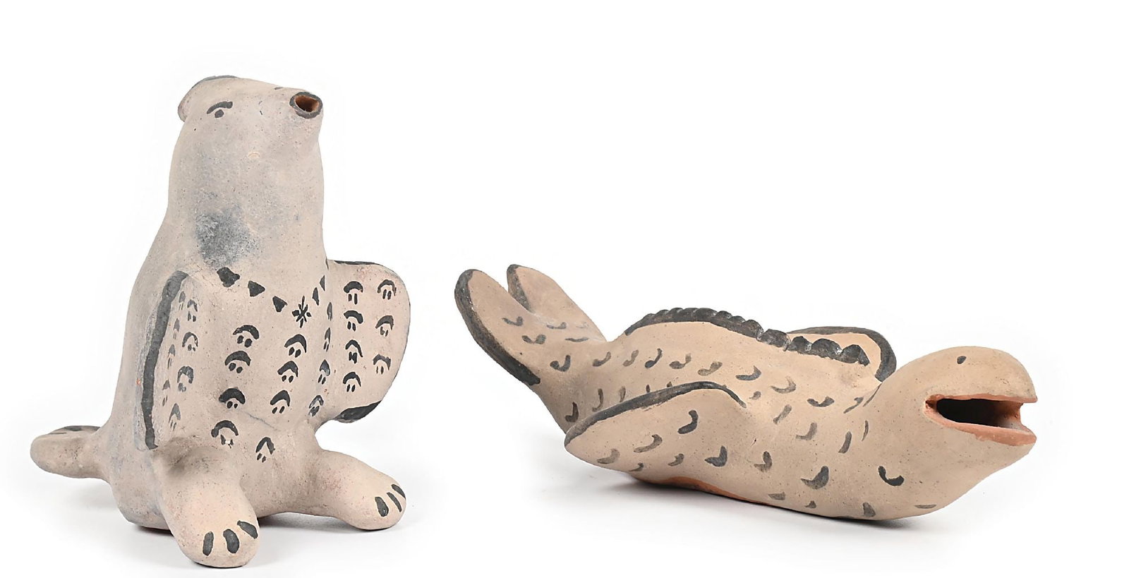 LOT OF 2: COCHITI PUEBLO POTTERY FIGURES BY DAMACIA CORDERO (1905-1989): Each signed on base "Damacia Cordero". (A) Fanciful bird figure. (B) Fanciful flying fish. Dimensions: Largest: 9 - 1/2" x 4 - 1/2" x 2 - 3/4".