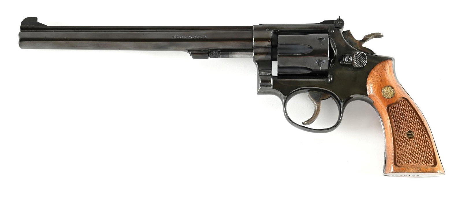 (C) SMITH & WESSON MODEL 17-3 DOUBLE ACTION REVOLVER.: Dates to 1975. Built on the square butt 3-screw K frame with pinned barrel, recessed chambers, adjustable rear sight, Patridge front sight, blue finish, case colored wide spur target hammer, wide serr