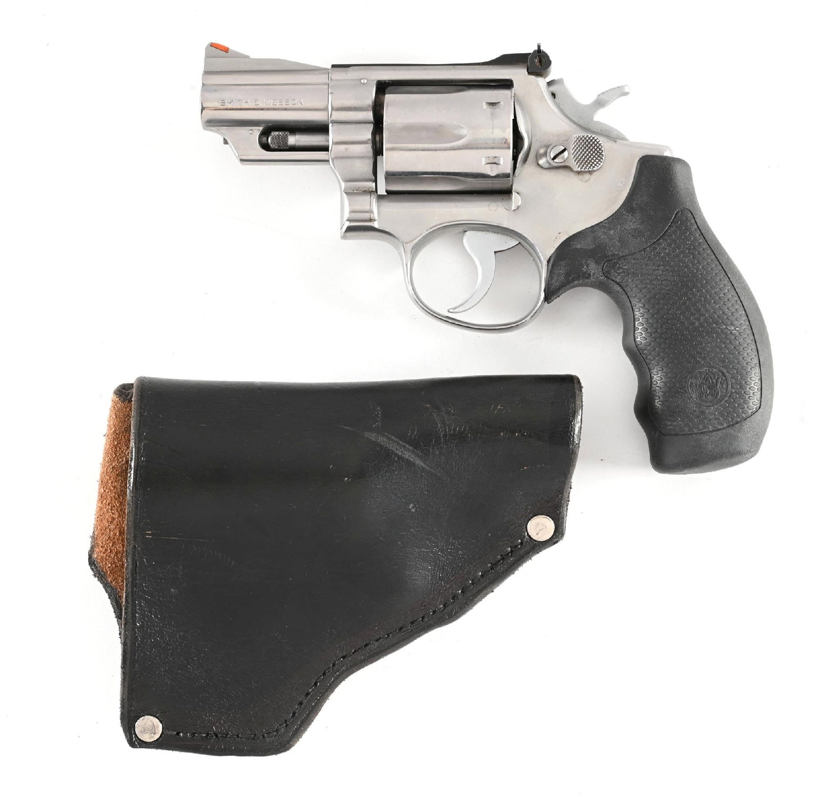 (C) SCARCE SMITH & WESSON MODEL 66 NO DASH DOUBLE ACTION REVOLVER.: Dates to 1975. Stainless construction. Built on the round butt 3-screw K-frame with a pinned barrel and recessed chambers. Features an adjustable rear sight, red insert front sight, and S&W rubber fin