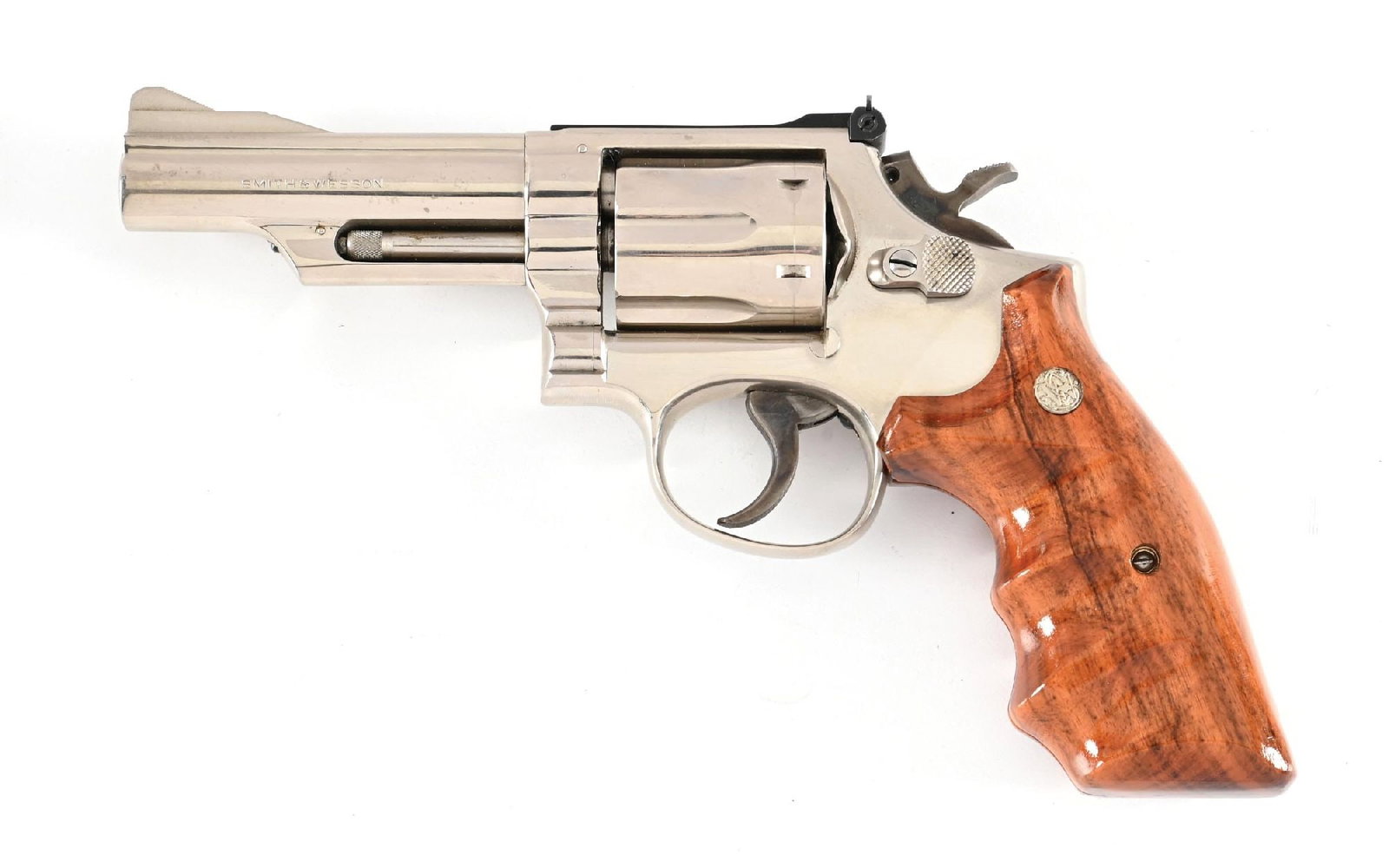 (C) SMITH & WESSON MODEL 19-3 DOUBLE ACTION REVOLVER.: Dates to 1970. Built on the 3-screw square K frame with the pinned barrel and recessed chambers. Nickel finish with adjustable blued rear sight, case colored hammer and trigger, and S&W finger groove