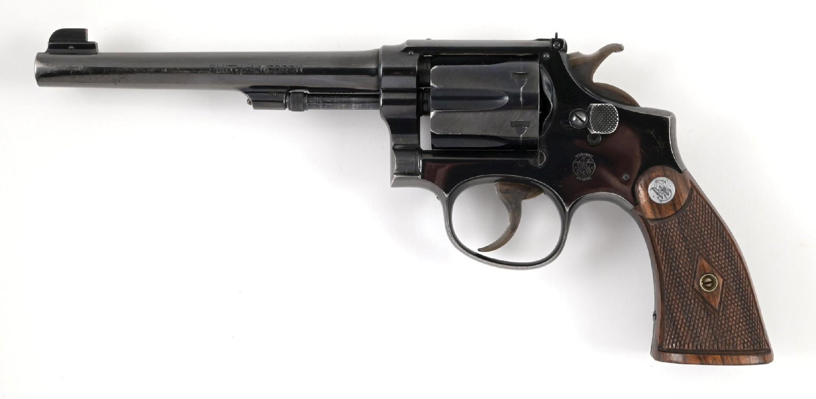 (C) SMITH & WESSON FIRST MODEL K22 OUTDOORSMAN DOUBLE ACTION REVOLVER.: Offered from 1931 through 1940. Built on the square butt 5-screw K-frame with pinned barrel, recessed chambers, round top frame with adjustable target sight, case color hammer with patent date stamp, 