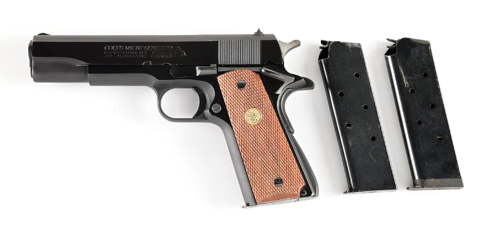 (M) COLT GOVERNMENT MODEL MKIV SERIES 70 1911A1 .45 ACP SEMI-AUTOMATIC PISTOL.: Circa 1982 per serial number. Serrated slope front sight with added white paint highlight, square notch drift adjustable rear sight, typical Colt legends throughout. Narrow hammer, long A1 style grip 