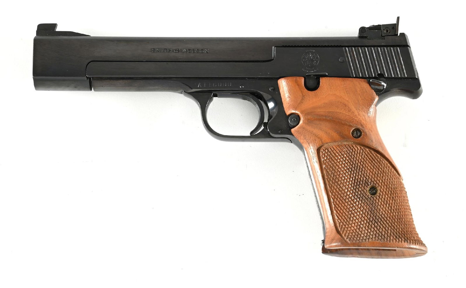 (C) SMITH & WESSON MODEL 41 SEMI AUTOMATIC TARGET PISTOL.: The A prefix began in 1970 at serial number 115001 so this gun probably dates from 1970-1972. Standard blue finish with the adjustable target rear sight, checkered walnut target grips, and comes with 