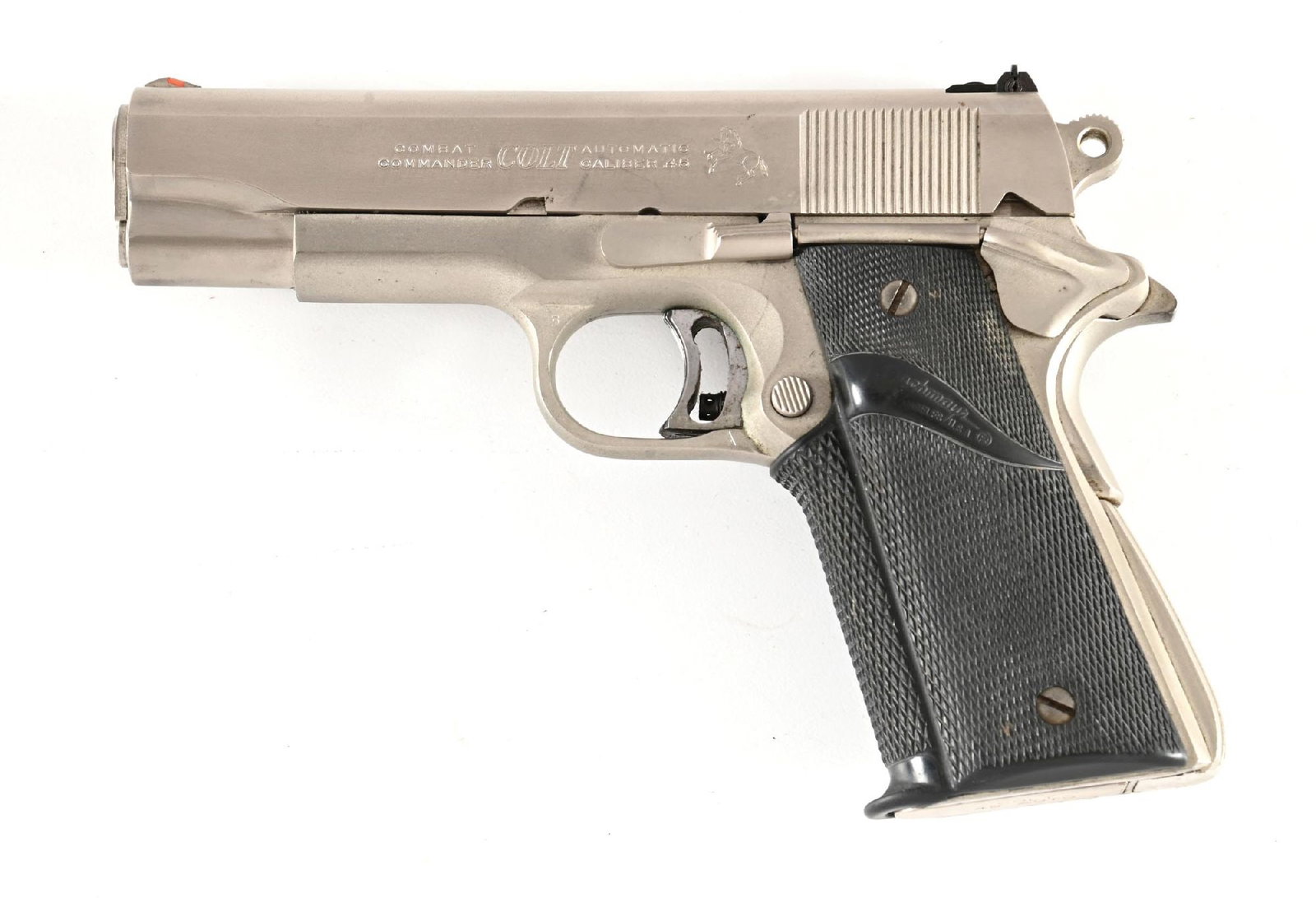 (C) COLT COMBAT COMMANDER 1911A1 .45 ACP SEMI AUTOMATIC PISTOL.: Dates to 1972. Features the electroless nickel finish, added adjustable target rear sight, red insert on front sight, Gold Cup National Match style trigger, and Pachmayr wrap around rubber grips. COND