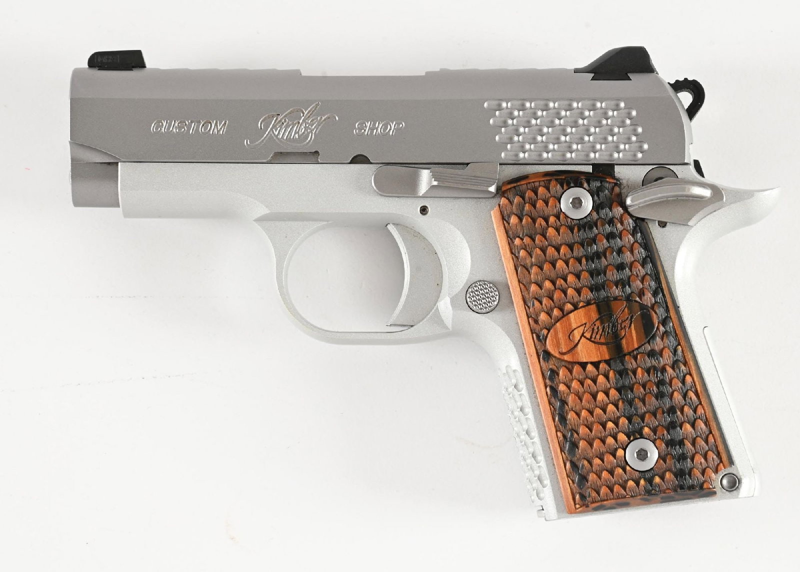 (M) CUSTOM SHOP KIMBER MICRO 9 RAPTOR 1911 SEMI-AUTOMATIC PISTOL.: Patterned after a small scale 1911 but made without a grip safety. Three dot tritium night sights with fishscale serrations on front strap, rear cocking serrations, and single scales across top of rib