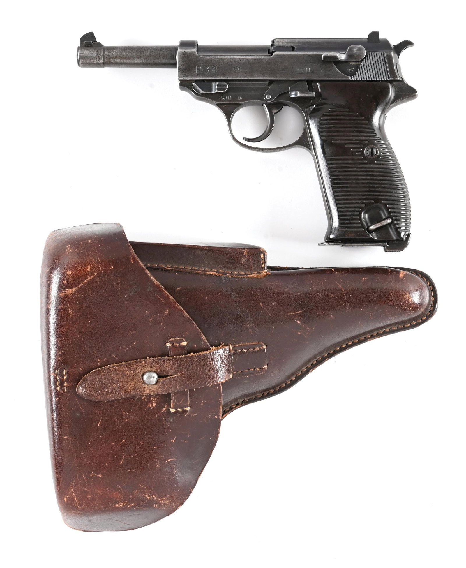 (C) SPREEWERK P.38 SEMI-AUTOMATIC PISTOL WITH HOLSTER.: Circa late 1943 production. Standard configuration with dull blued finish and dark Bakelite grips. "jvd" code magazine with "C358" stamped on the base. Matching numbers observed on the frame, slide, b