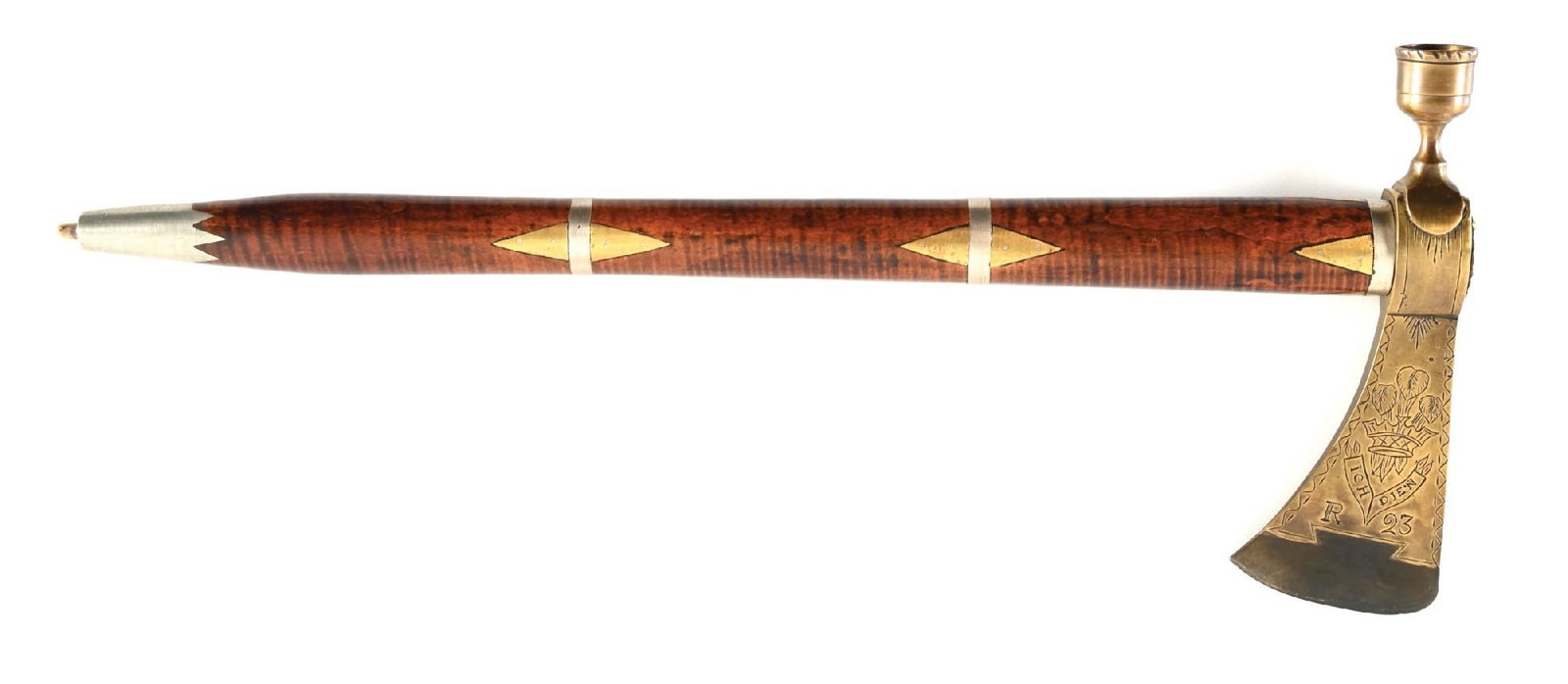 CONTEMPORARY PIPE TOMAHAWK.: Features a striped maple haft with alloy and brass decorations. Brass head and bowl with carbon steel blade. Head is decorated with royal motifs and is marked "ICH DIEM" in a banner above "R23" on rev
