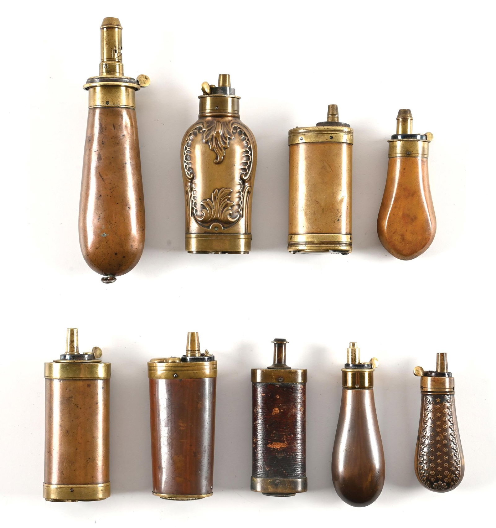 LOT OF 9: PISTOL FLASKS. (1 of 1)