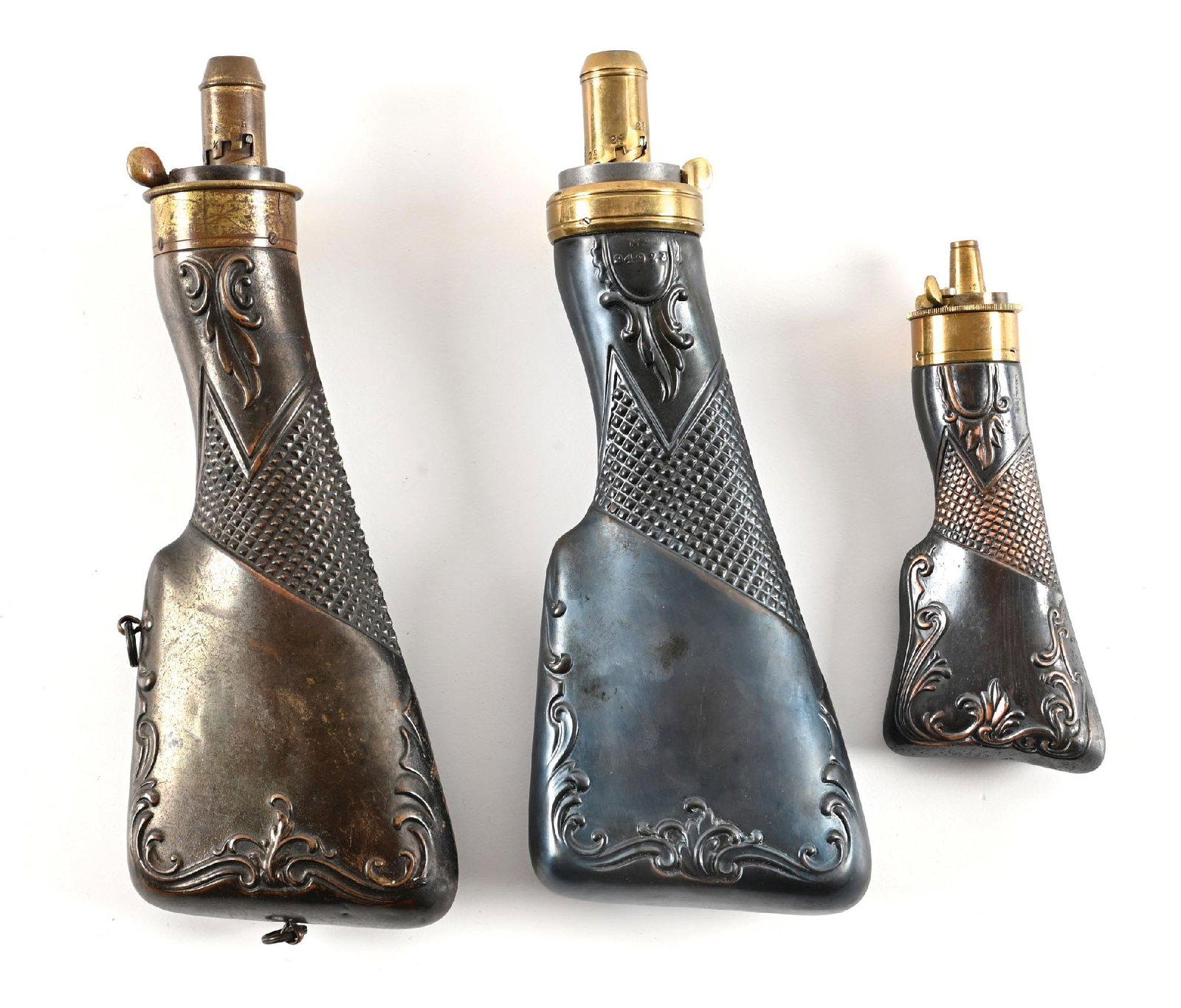 LOT OF 3: GUN STOCK STYLE POWDER FLASKS. (1 of 2)