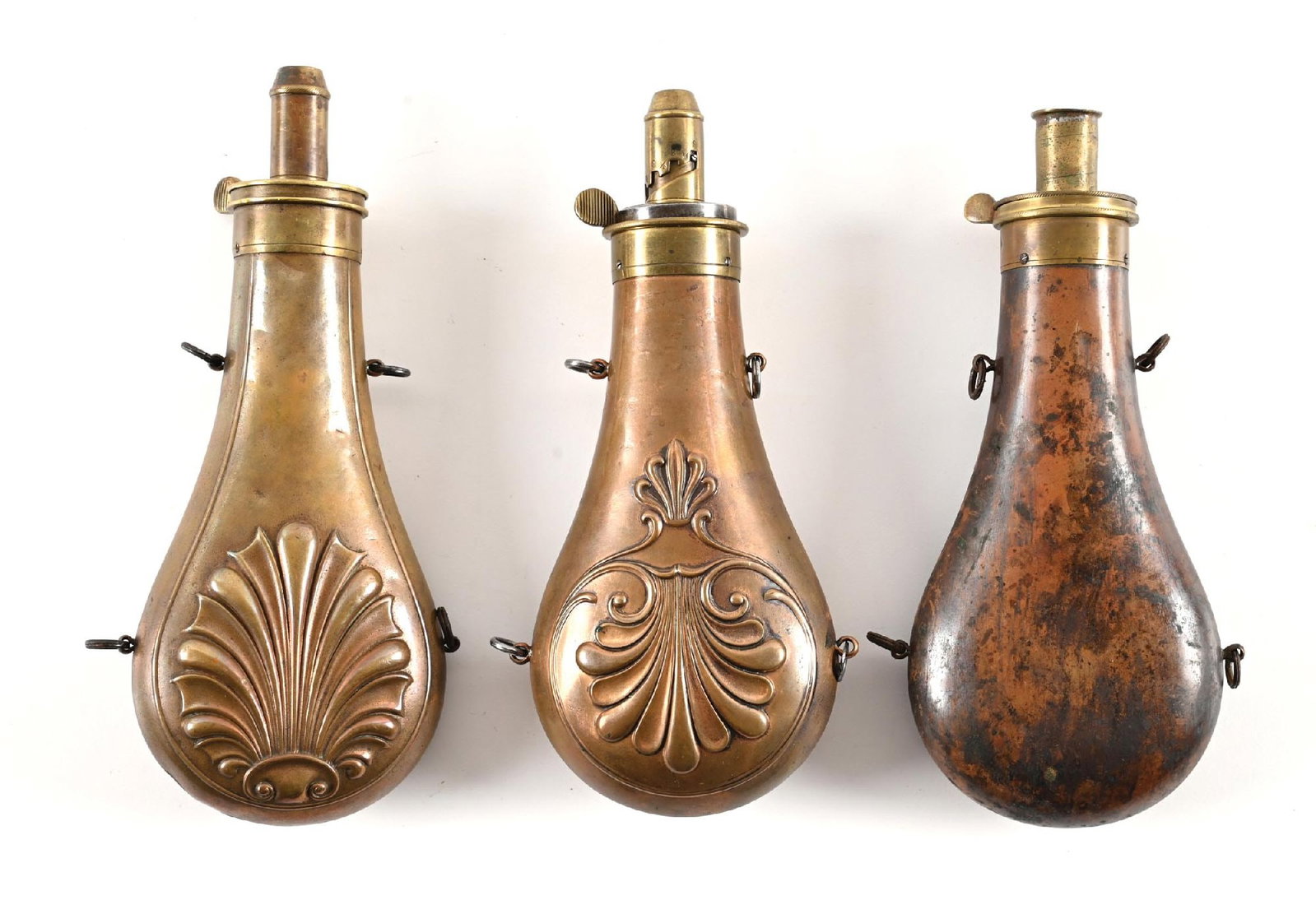 LOT OF 3: UNUSUAL MAKER STAMPED BRASS POWDER FLASKS. (1 of 2)