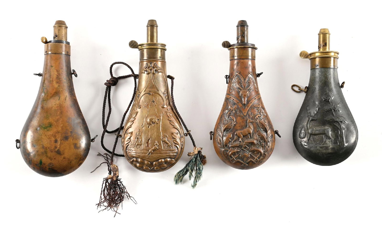 LOT OF 4: AMERICAN FLASK CO. HUNTING THEMED BRASS POWDER FLASKS. (1 of 2)