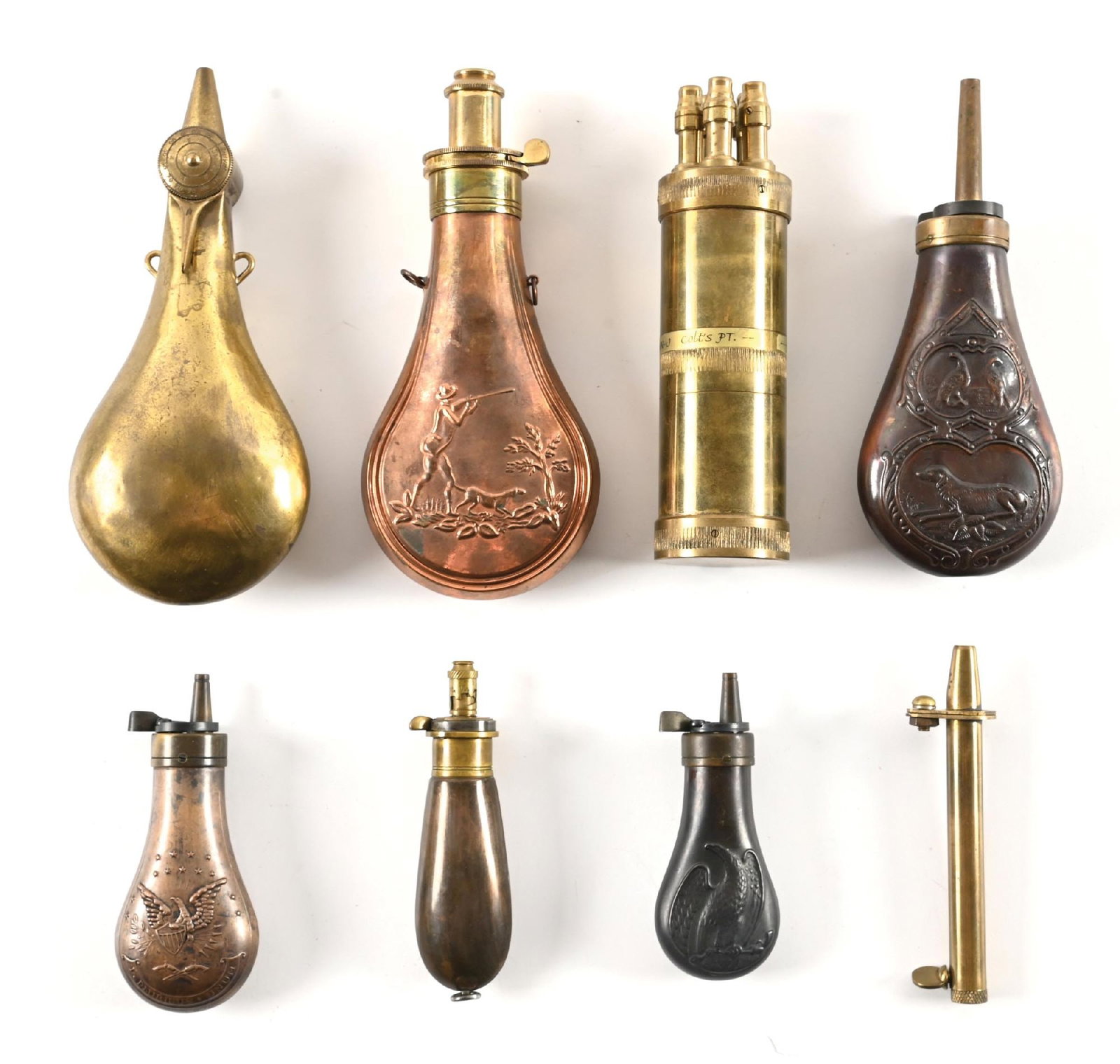 LOT OF 8: CONTEMPORARY POWDER FLASKS: Lot includes a high quality copy of the rare Colt Patterson No. 5 five spout plunger flask, two small Colt pocket pistol eagle motif flasks that have been wonderfully aged, a Hawksley English small ba