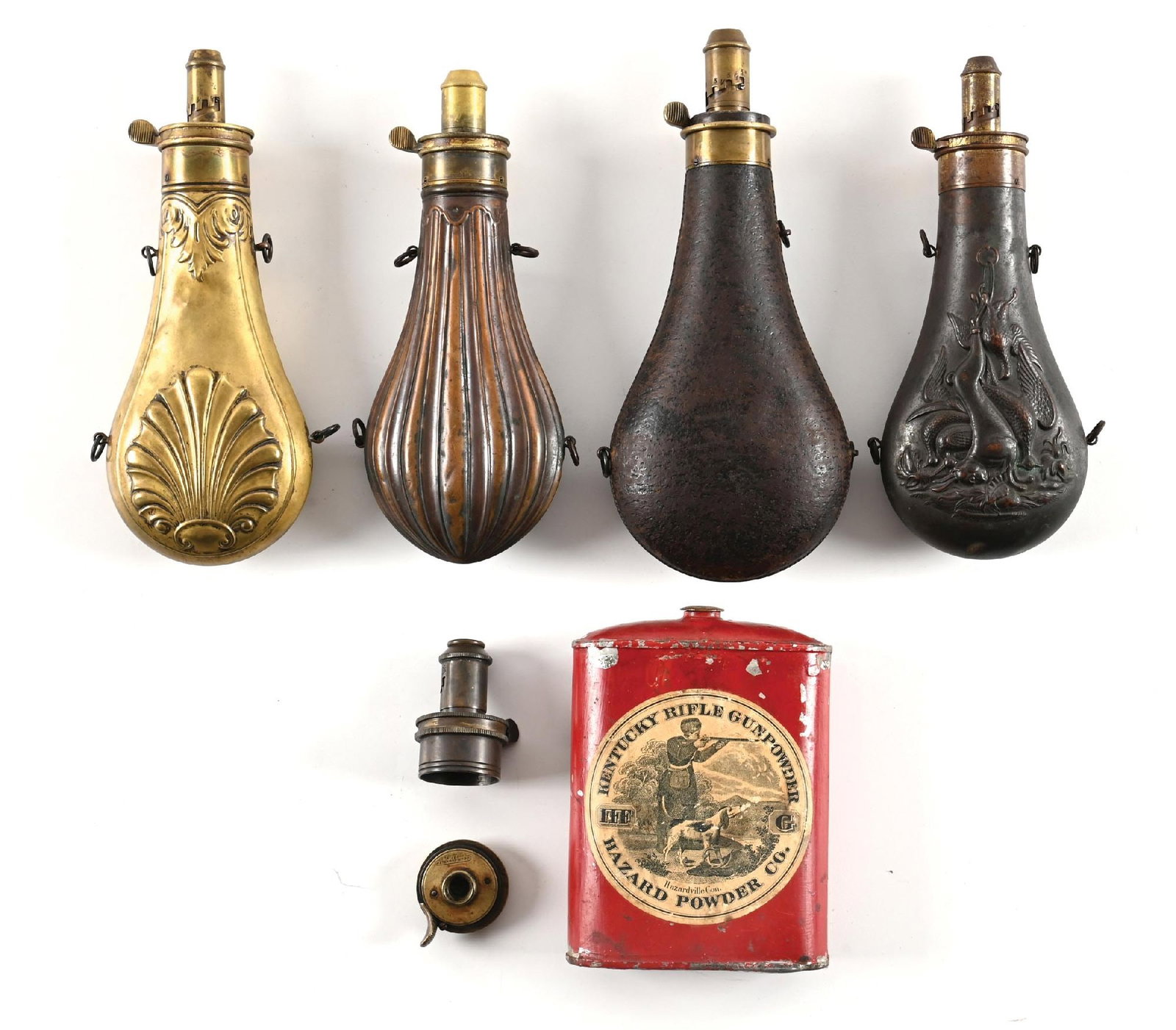 LOT OF 4: INTERESTING BRASS AND LEATHER POWDER FLASKS WITH POWDER CAN. (1 of 2)