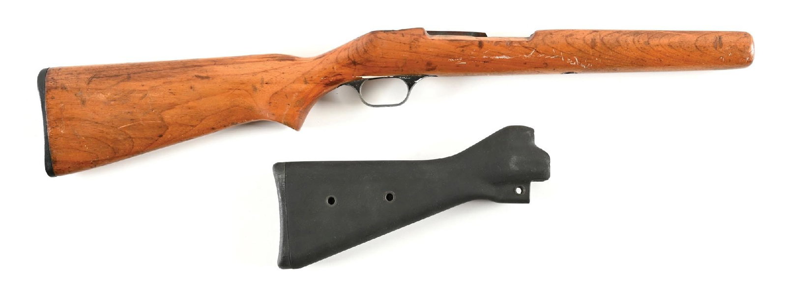 LOT OF 2: SPRINGFIELD 87 AND MP5 STOCKS.: Lot consists of: (A) Unmarked stock which appears to be for Springfield 87 with painted alloy trigger guard and ribbed composition butt plate. CONDITION: Fair showing heavy handling and use. (B) Unmar