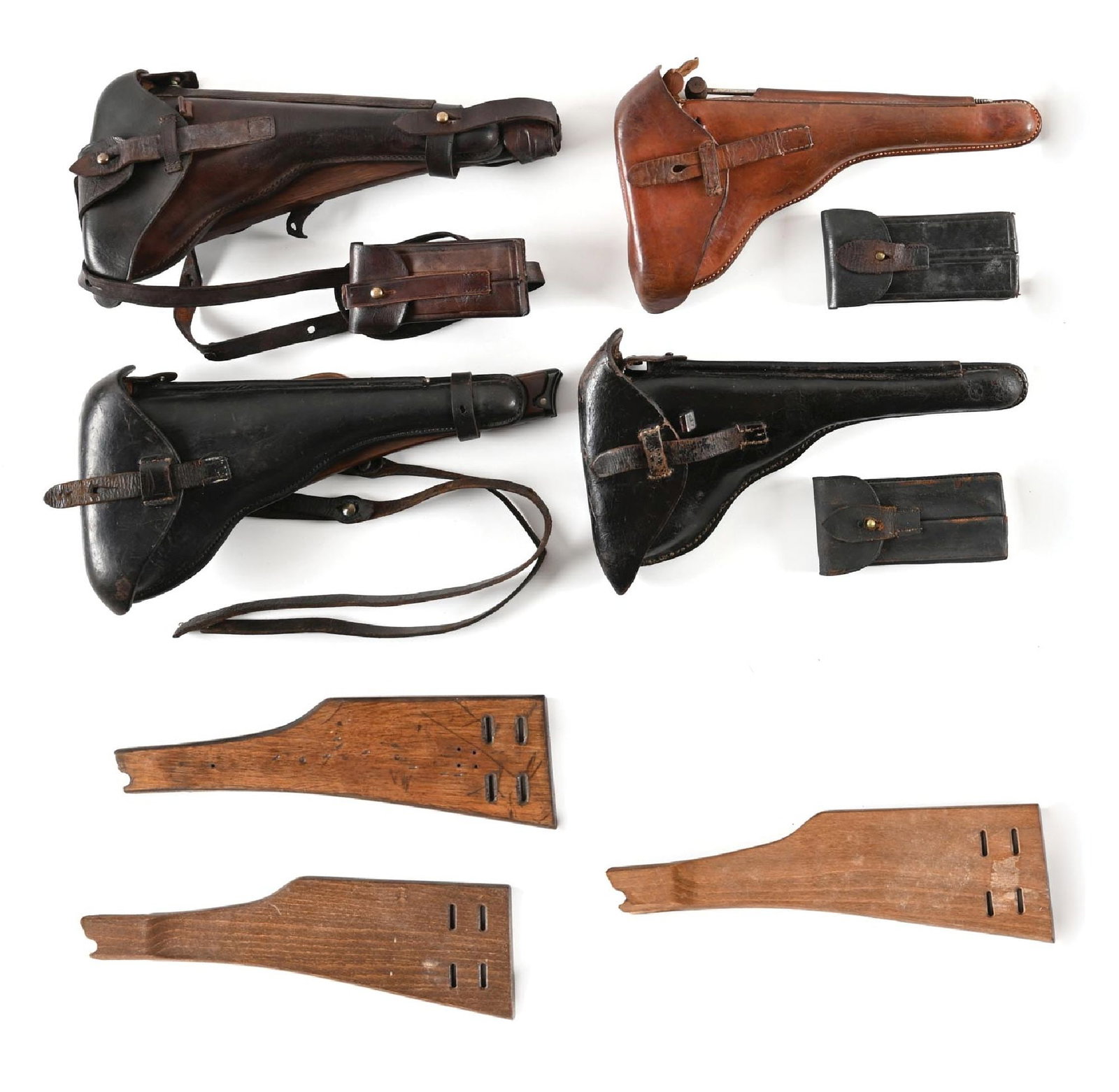 LOT OF (4) ARTILLERY LUGER HOLSTERS WITH STOCKS AND ACCESSORIES. (1 of 1)