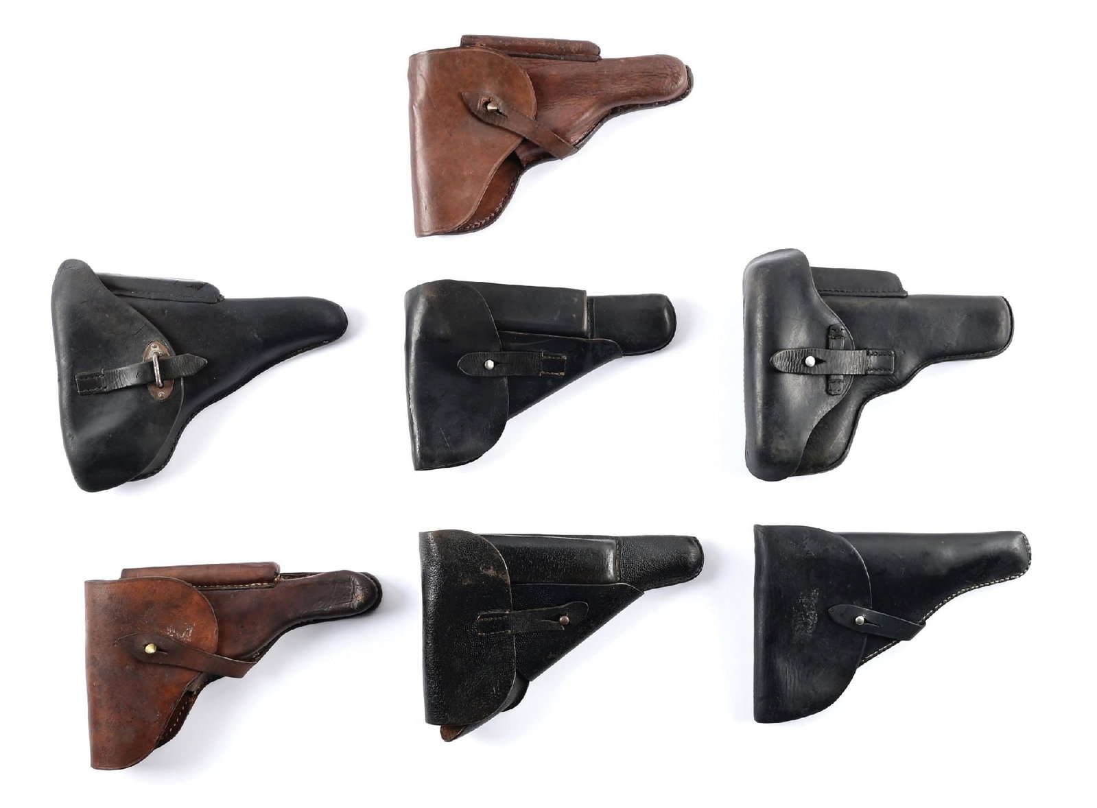LOT OF (7) MISCELLANEOUS GERMAN WWII HOLSTERS.: Large lot of mostly unmarked semi auto military holsters to include a pig skin, another stamped Eigenium Wein, holsters made for the Belgium Luger, Hi-Power and P-38, etc. All are in very good to exce