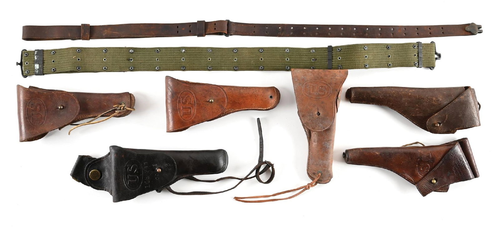 LOT OF (6) US WWI-WWII LEATHER PISTOL HOLSTERS.: These first four are all made for the Colt Model 1911 to include a 1942 Milwaukee Saddlery with green canvas belt and a 1945 dated Milwaukee, 1917 Warren Leather and a Rock Island U.S. Model 1912 Cava