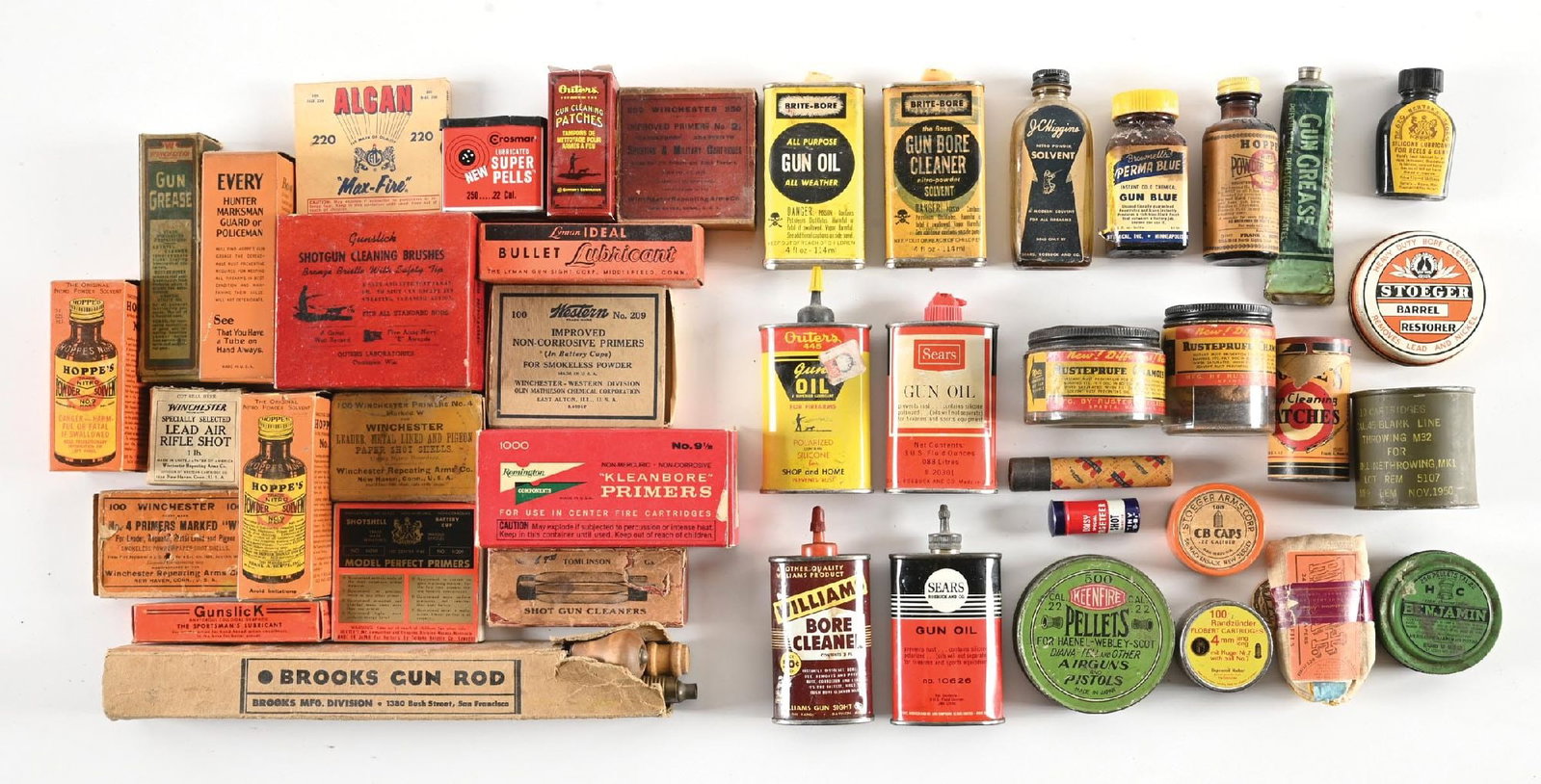 LOT (35) VINTAGE FIREARMS RELATED INCLULDING WINCHESTER GREASE, OIL, AND OTHER ITEMS: Lot includes (5) primer containers including (4) antique Winchester and a full box of 1000 1950'd Remington's, (6) oil cans including Sears, Williams Gun Sight, Mill Run and Outers, (5) solvents inclu