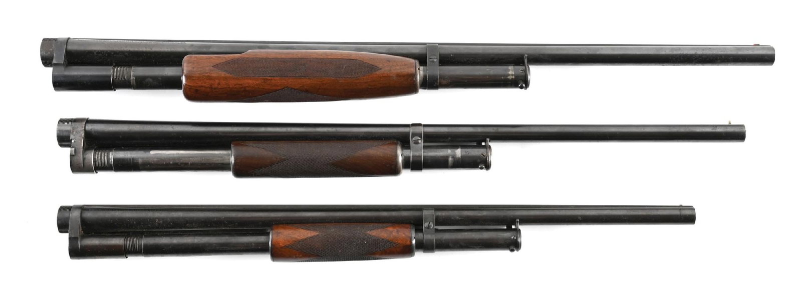 LOT OF 3: DELUXE WINCHESTER MODEL 1897 AND MODEL 12 SHOTGUN BARREL ASSEMBLIES.: Lot consists of: (A) Circa 1936 Model 12 barrel assembly in 12 gauge, serial number "714258" with factory matted solid rib, red Bradley style front sight, mid-rib bead, Full choke, and checkered walnu
