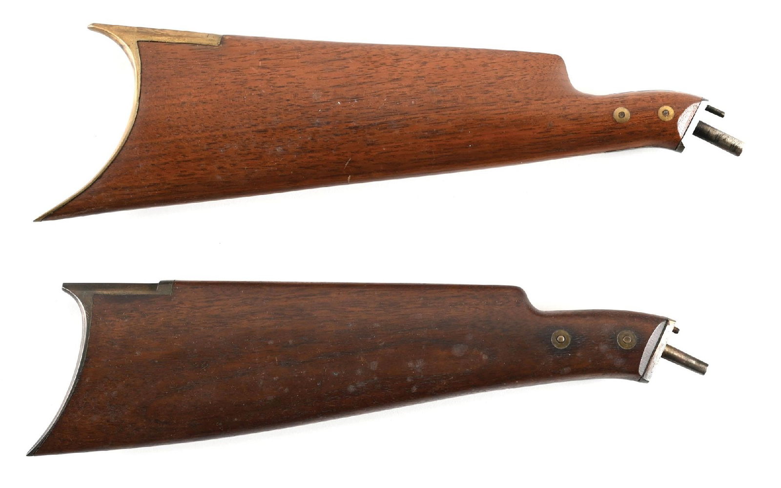 LOT OF (2) PERIOD VOLCANIC BREVETTE NAVY SHOULDER STOCKS.: Unlicensed copies of the Volcanic repeating pistol were made during the mid 19th century in both France and Belgium. These are wo detachable walnut stocks as made in Europe at that time. Both feature 