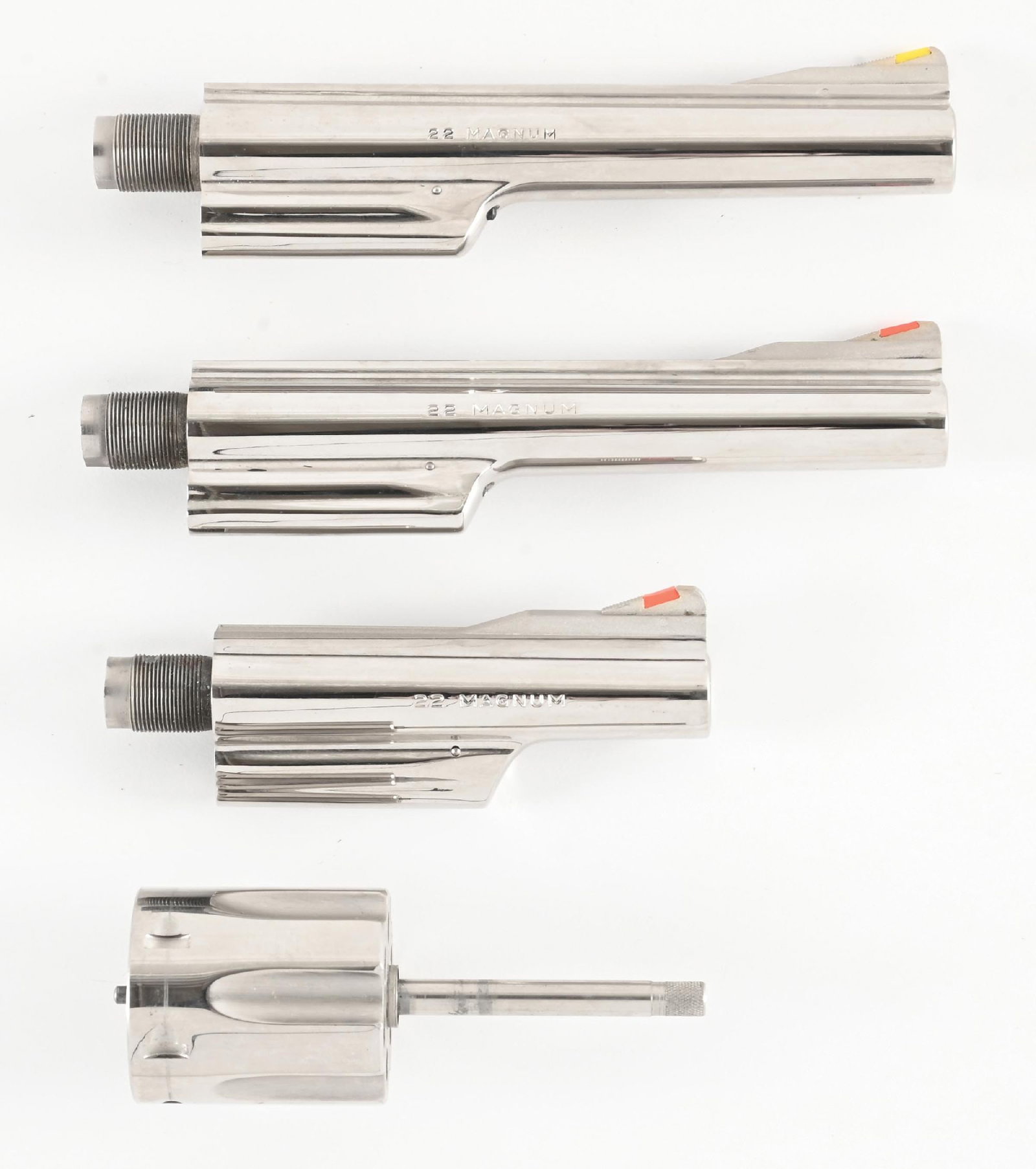 LOT OF (4) NICKEL SMITH & WESSON MODEL 48 . 22 MAGNUM REVOLVER BARRELS AND CYLINDER.: All are nickel finished , all with ramp style front sights, two with red inserts and one with yellow. Includes two 6" barrels and one 4". All Smith & Wesson stamped as well as .22 MAGNUM stamped on ri