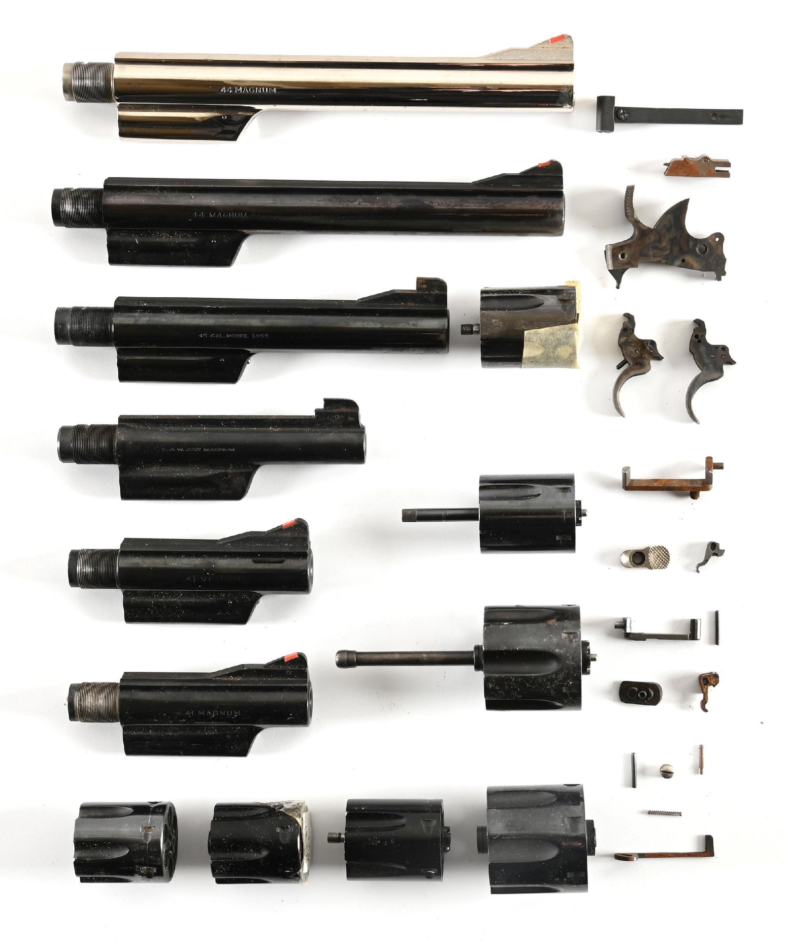 LOT OF VARIOUS SMITH & WESSON REVOLVER (6)BARRELS, (7) CYLINDERS, SMALL PARTS.: Lot consists of six barrels to include a Model 29 44 Magnum nickel 8 3/8" with insert front sight in near new condition, a blue example with same features but retaining 85% blue, two Model 57 41 Magnu