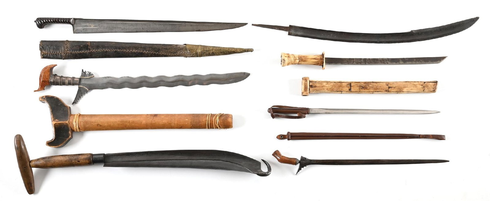 LOT OF 7 SOUTHEAST ASIAN SWORDS. (1 of 2)