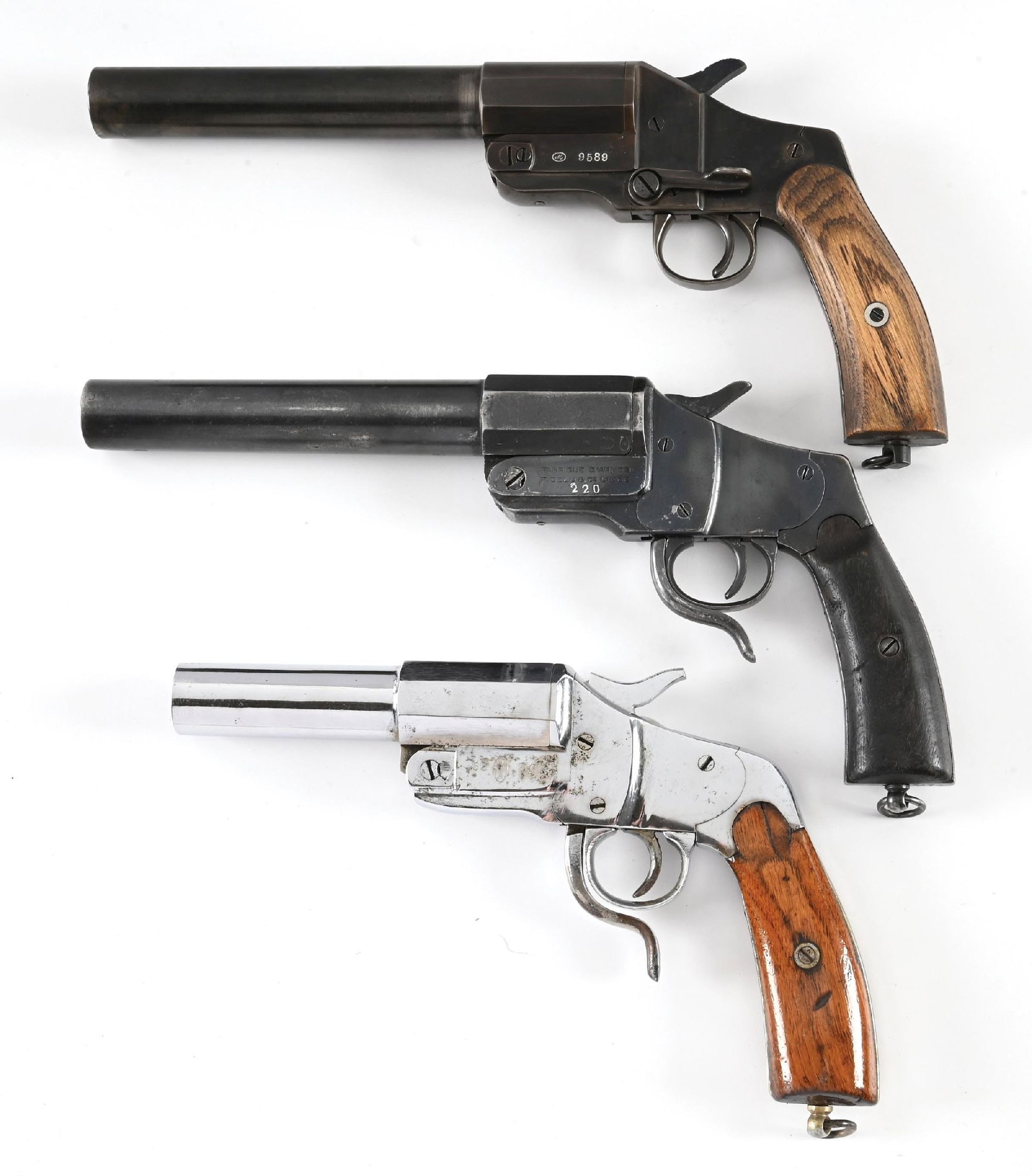 LOT OF 3: WWI ERA MODEL 1894 HEBEL FLARE PISTOLS.: Lot consists of: (A) Meffert production with blued steel construction, replacement wood grips, and an unusual numbers matching side lever release rather than the standard Hebel underlever. CONDITION: