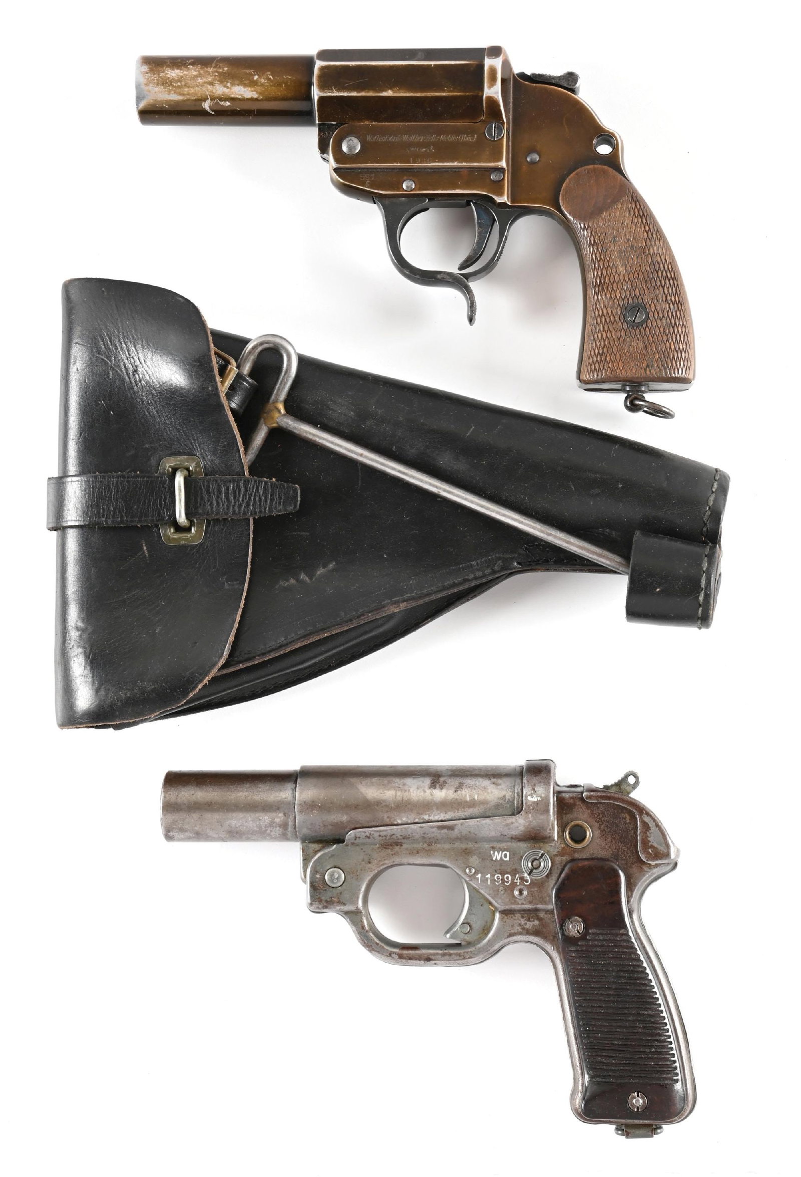 LOT OF 2: WWII GERMAN WALTHER LP-34 AND HUGO SCHNEIDER LP-42 FLARE PISTOLS.: Lot consists of: (A) Early, 1936 dated Walther LP-34 flare pistol with anodized alloy construction, nitre blued trigger and hammer, blued lever, and checkered walnut grips with lanyard loop butt.