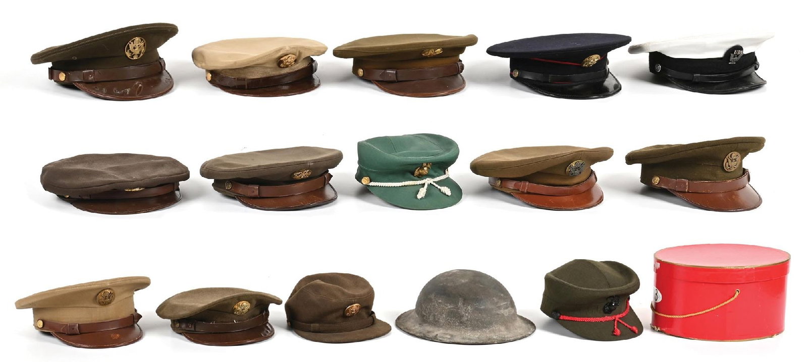 LOT OF 15: US ENLISTED VISOR HATS.: Lot consists of various US military enlisted visor caps including three women's hats (two USMCWR and one WAC). The hats are a mix of OD and khaki, most of which date to the World War II era while