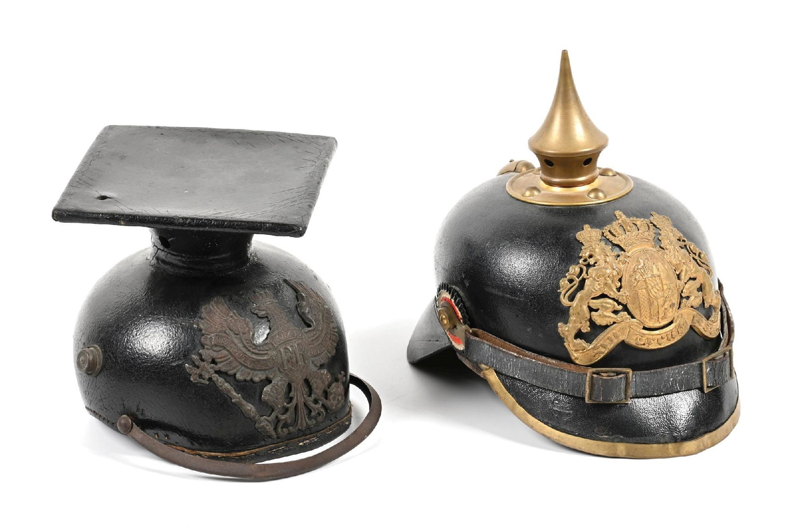 LOT OF 2: IMPERIAL GERMAN PRUSSIAN CHAPKA AND BAVARIAN PICKELHAUBE.: Lot consists of: (A) Imperial German Bavarian EM Pickelhaube. Front plate and top plate with spike appear original to the helmet. Black leather liner is supple with leather tie string present. chinstr