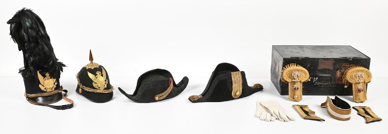 LOT OF 4: US DRESS HELMET, SHAKO, AND EUROPEAN FORE AND AFT HATS.: Lot consists of: (A) M1890 Dress Helmet. Cork construction with infantry rosettes. Crown is marked "J.H. McKENNEY & CO. / 141 GRANDS ST. N.Y.". Size "6 - 3/4" label present under front visor. Light